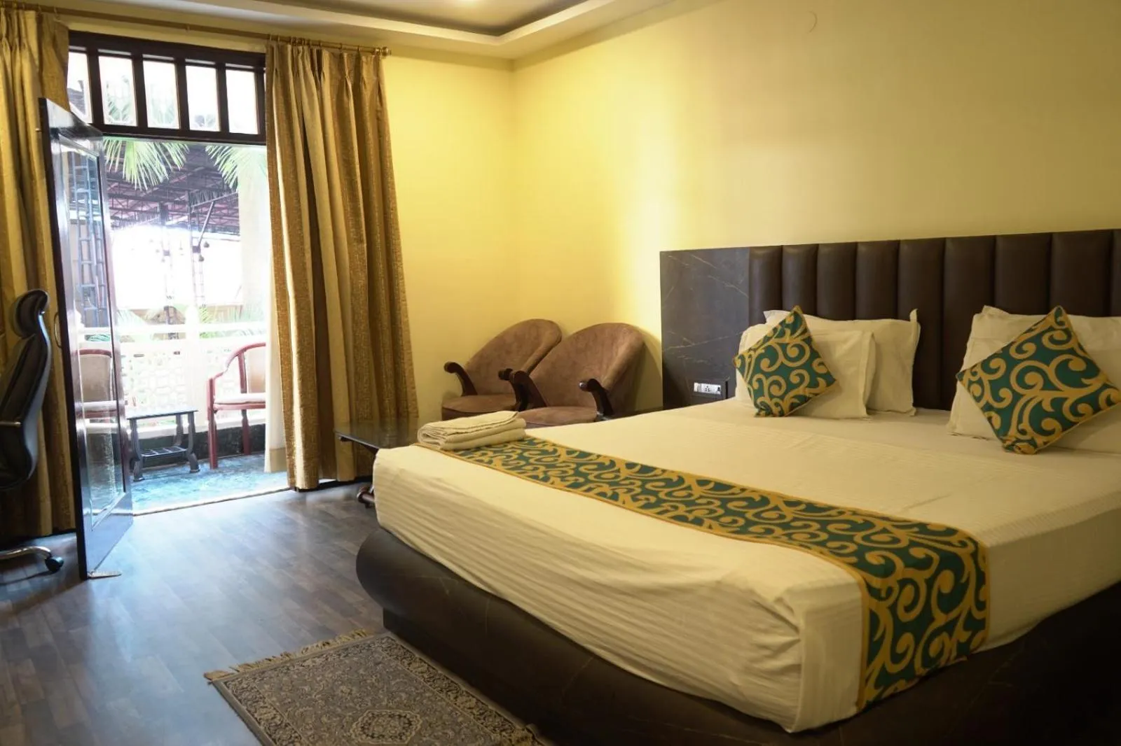 Balcony/Terrace, Bed in Hotel Tourist Inn By Sagar