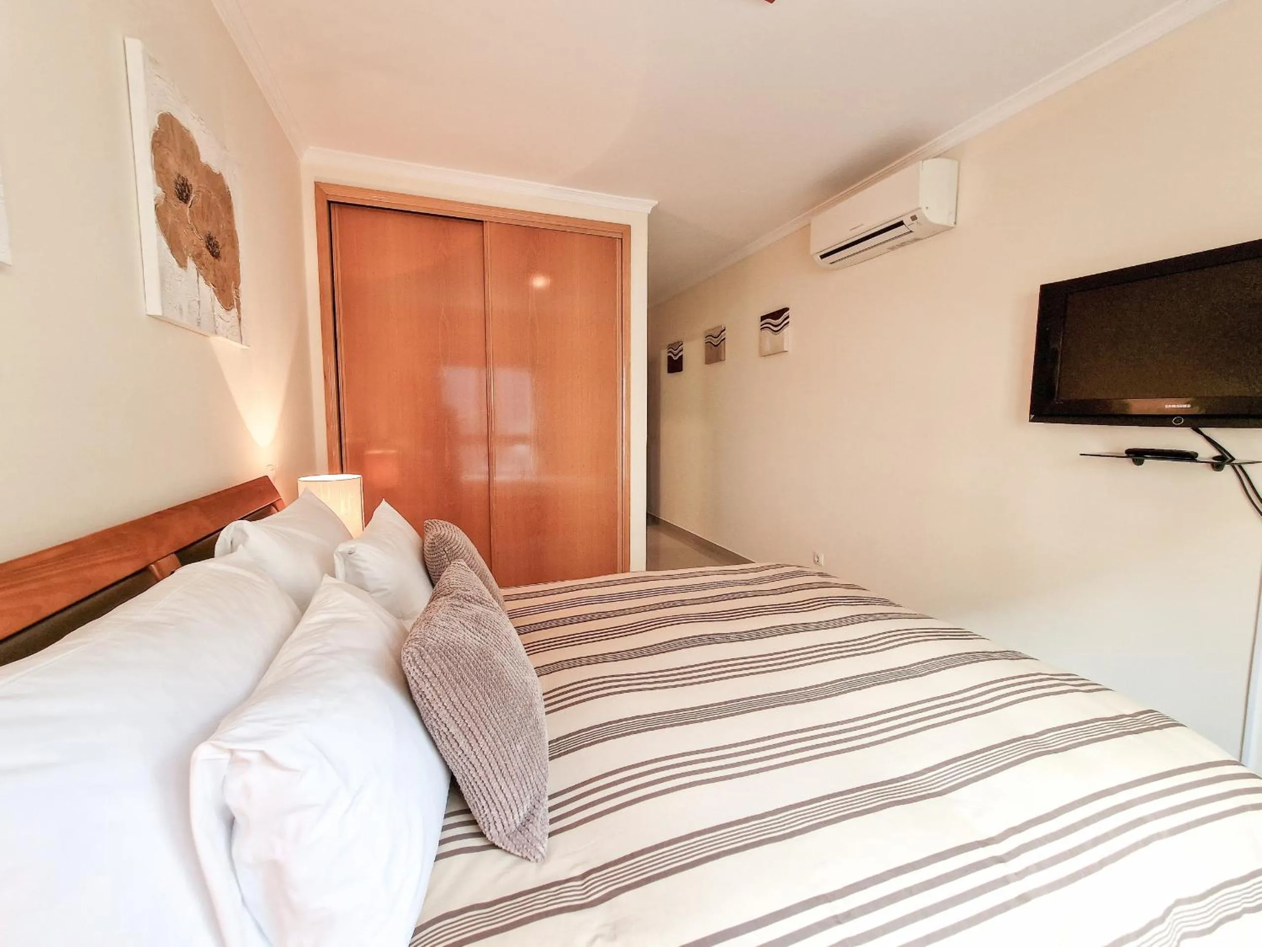 Bed in Apartment Rocha Oceano Azul Charming