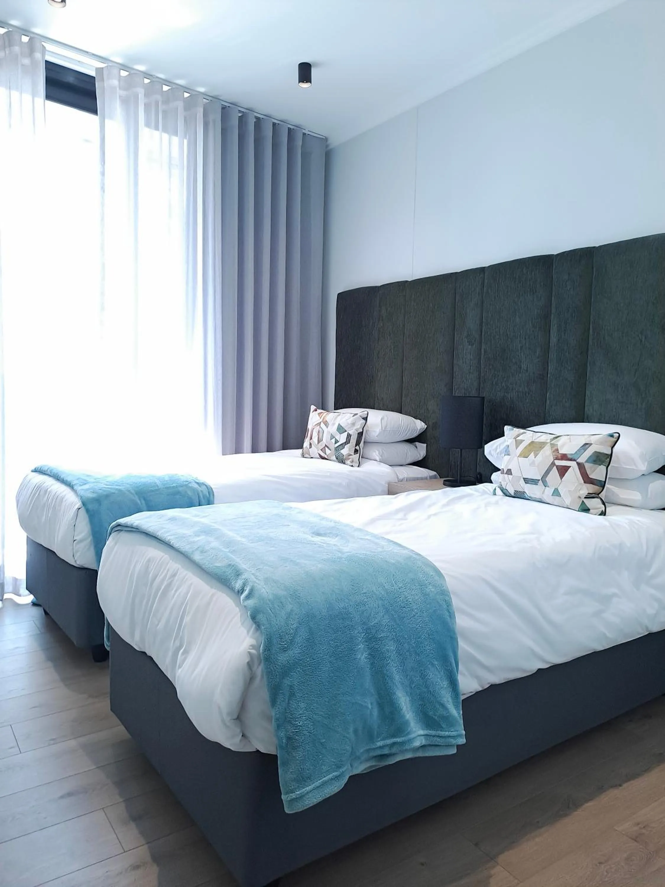 Bed in Executive Apartment at Ellipse Waterfall