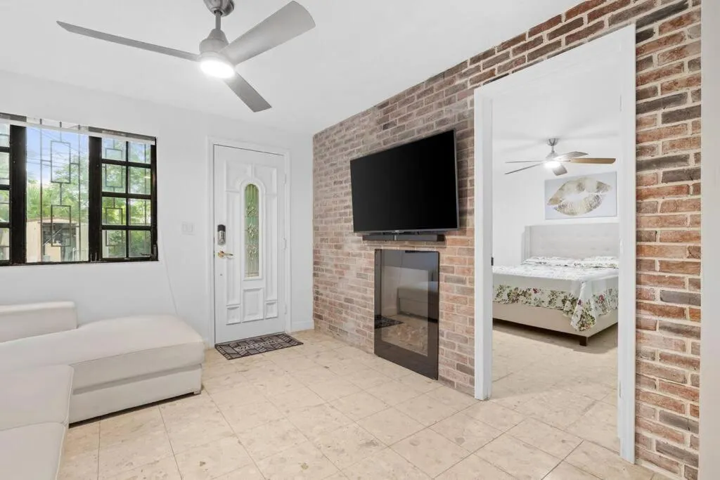 Communal lounge/ TV room in Little Havana Retreat - Newly remodeled Villa by Loan Depot Stadium!