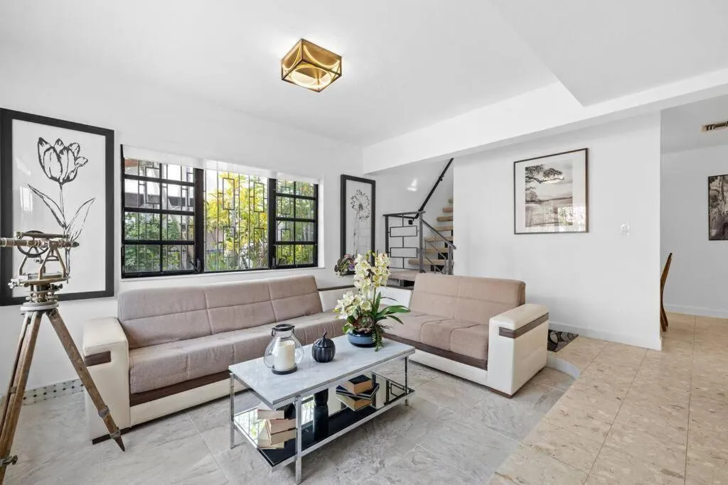 Living room in Little Havana Retreat - Newly remodeled Villa by Loan Depot Stadium!