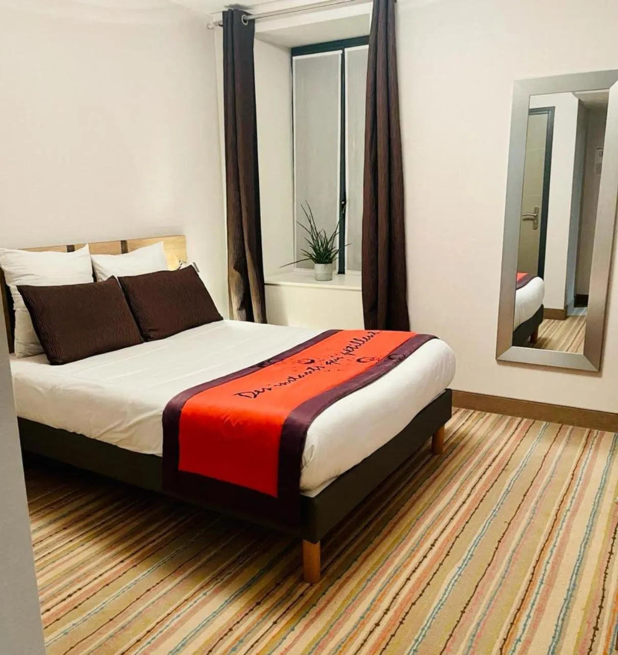 Bedroom in Au Coeur Des Bulles