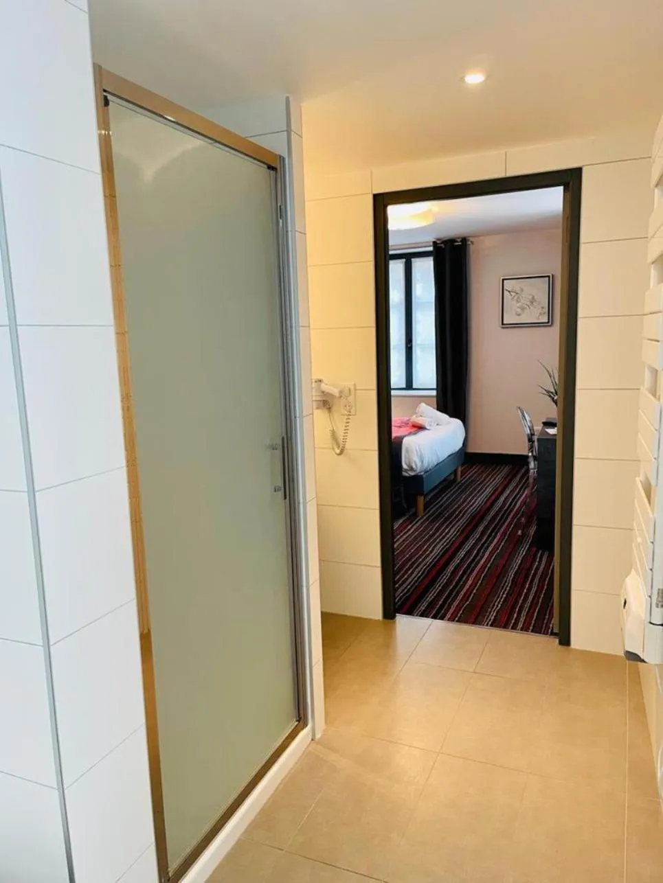 Bedroom in Au Coeur Des Bulles