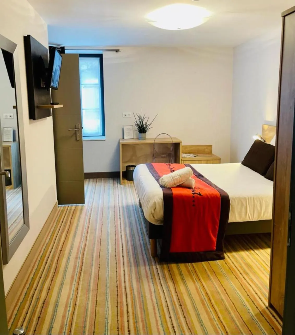 Bedroom in Au Coeur Des Bulles