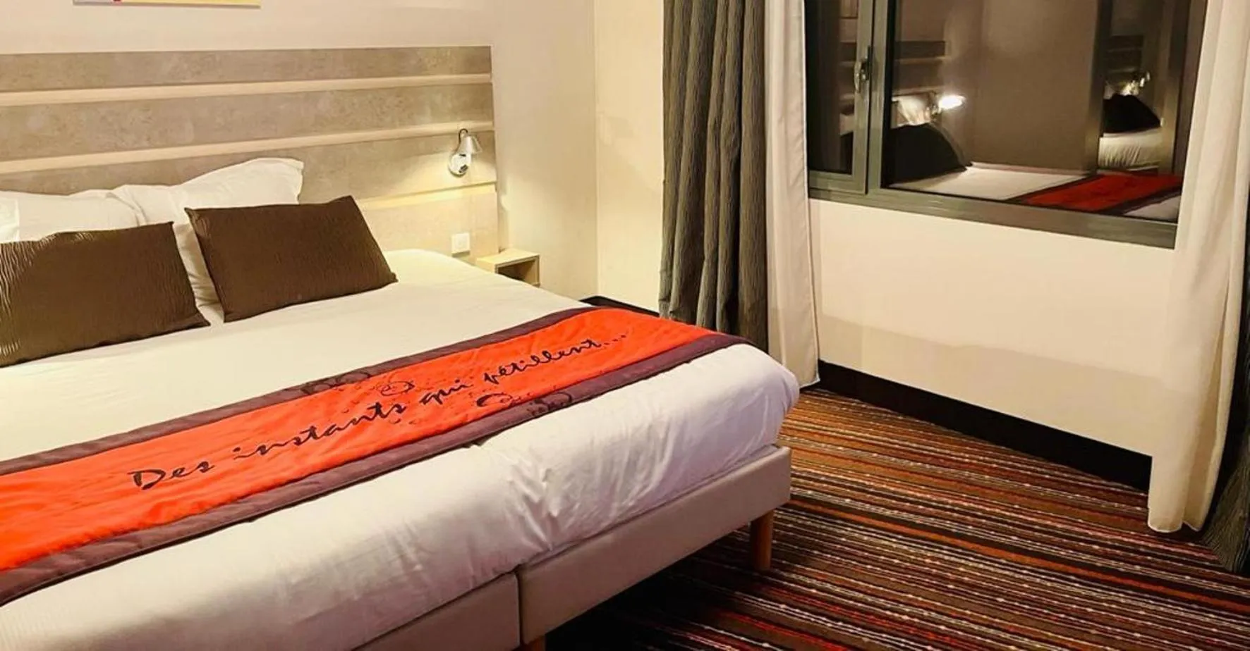 Bedroom in Au Coeur Des Bulles