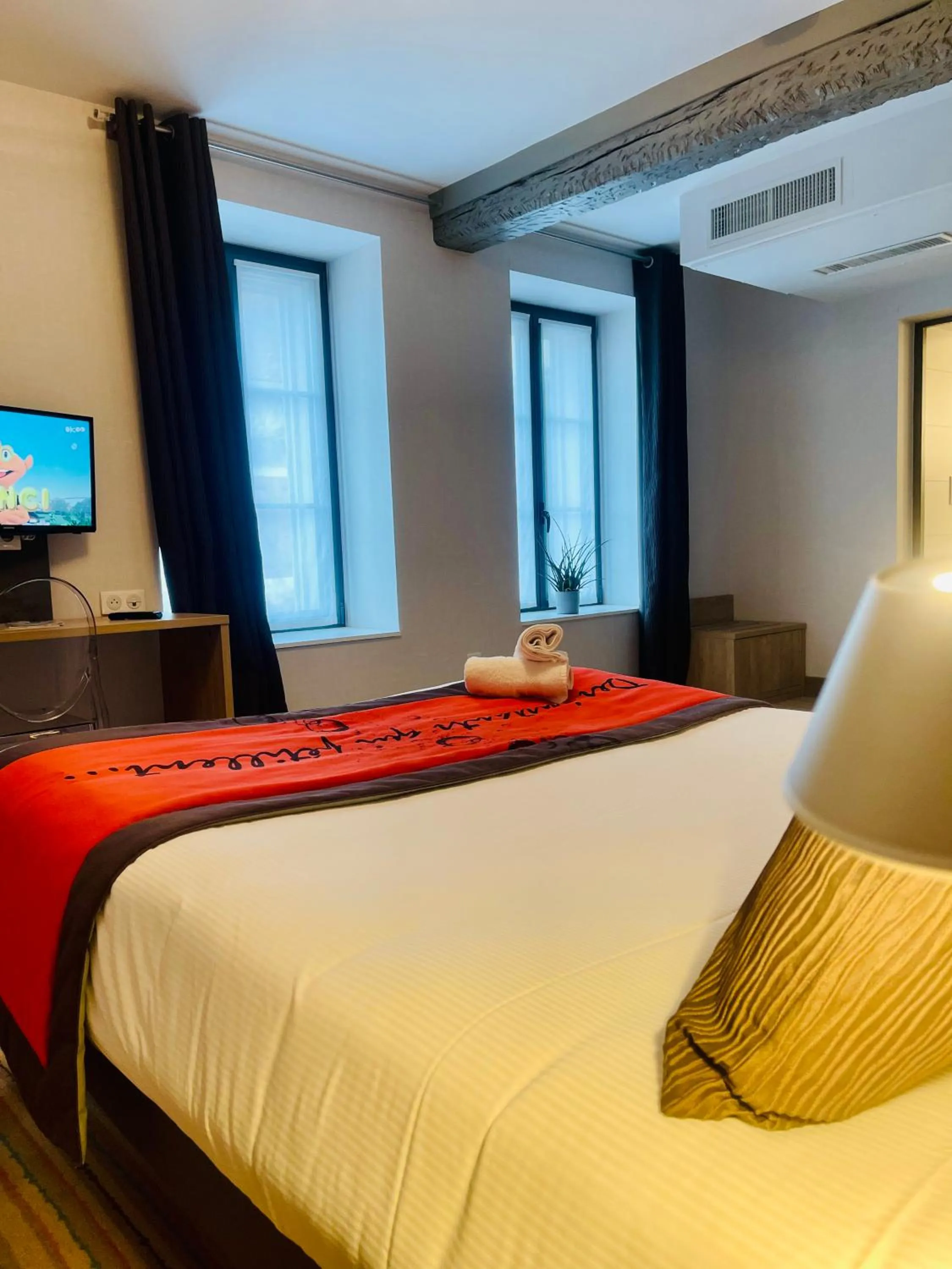 Bedroom in Au Coeur Des Bulles