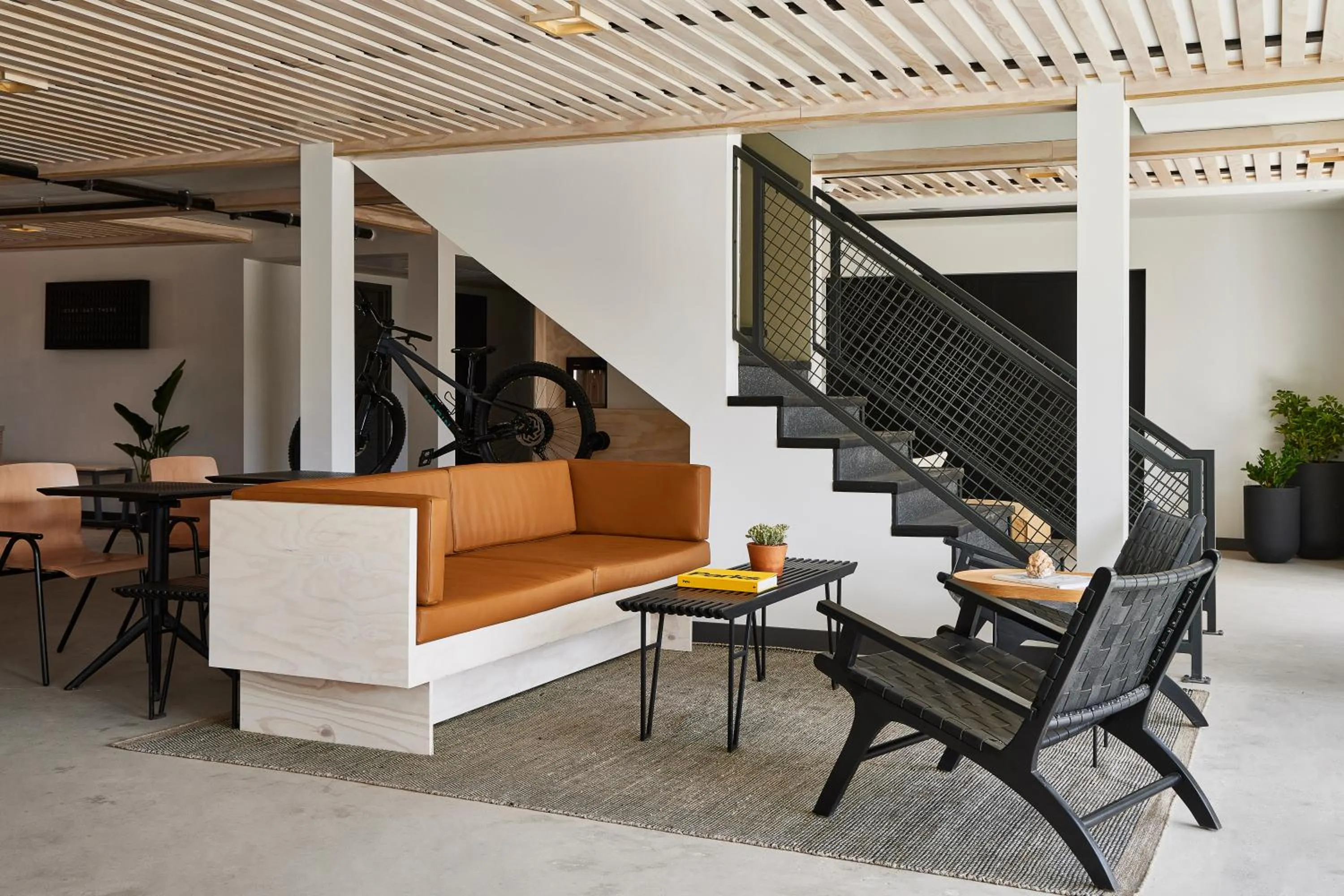 Communal lounge/ TV room in Slackline Moab, Outset Collection by Hilton