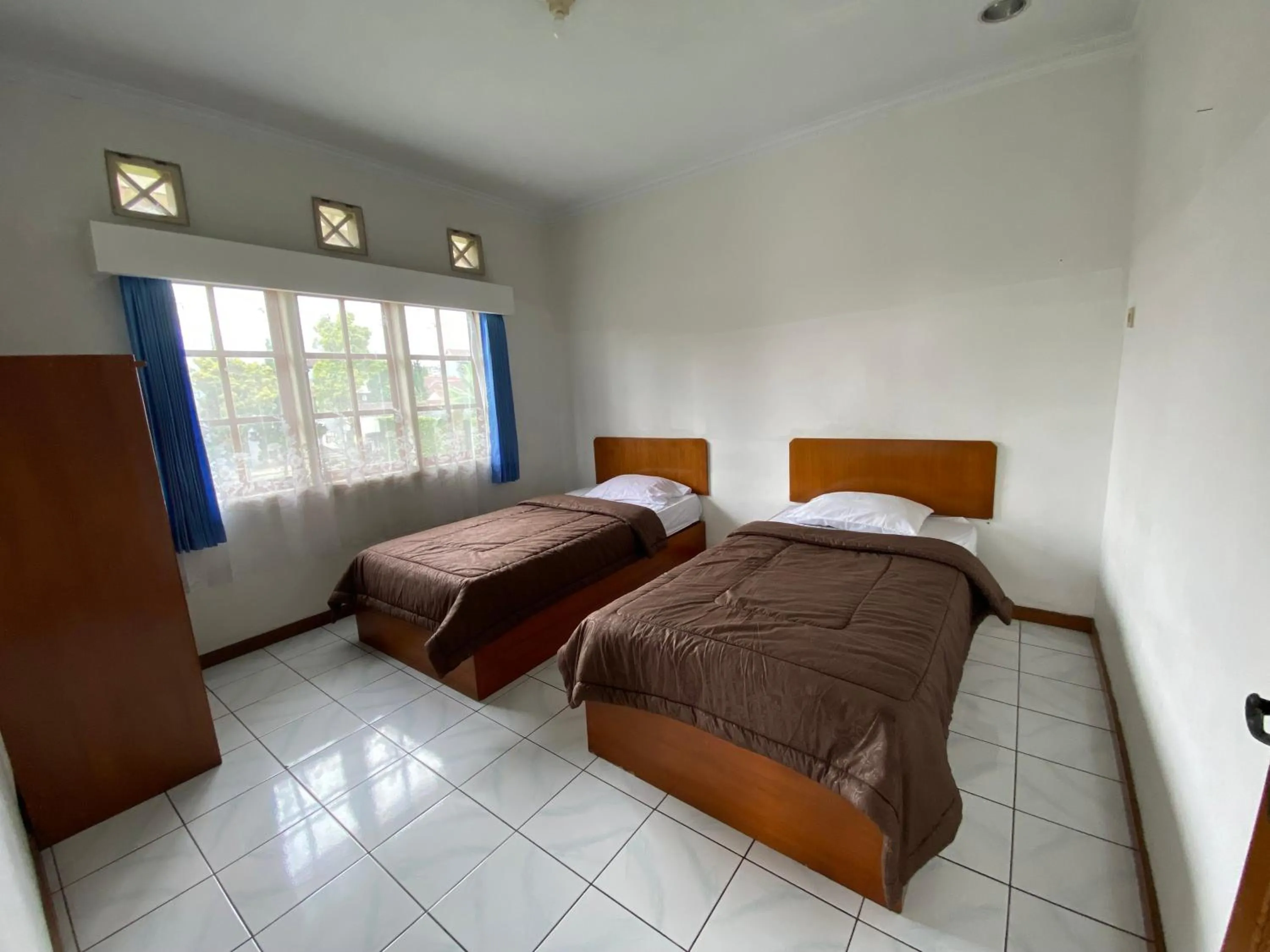 Bed in Hotel Puspa Sari