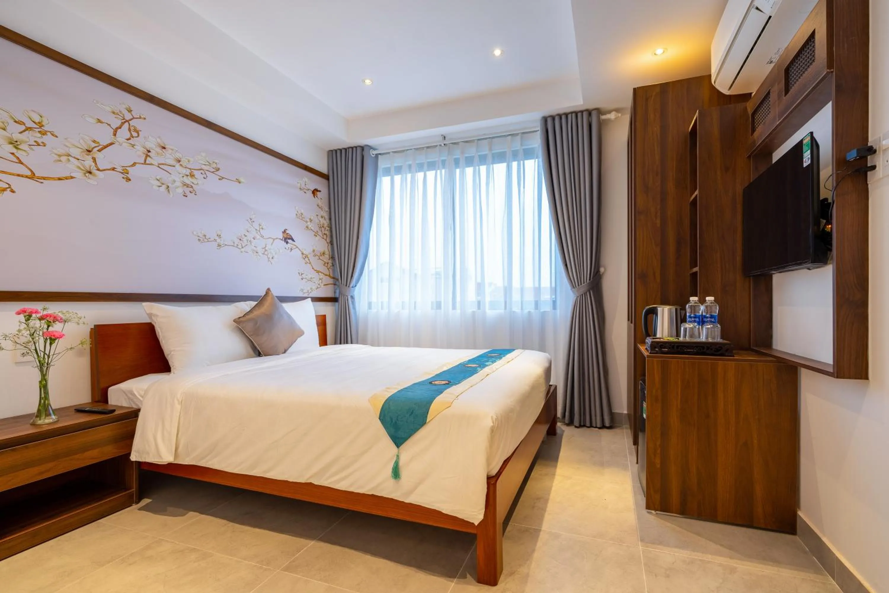 Bed in The Present River Villa Hoi An