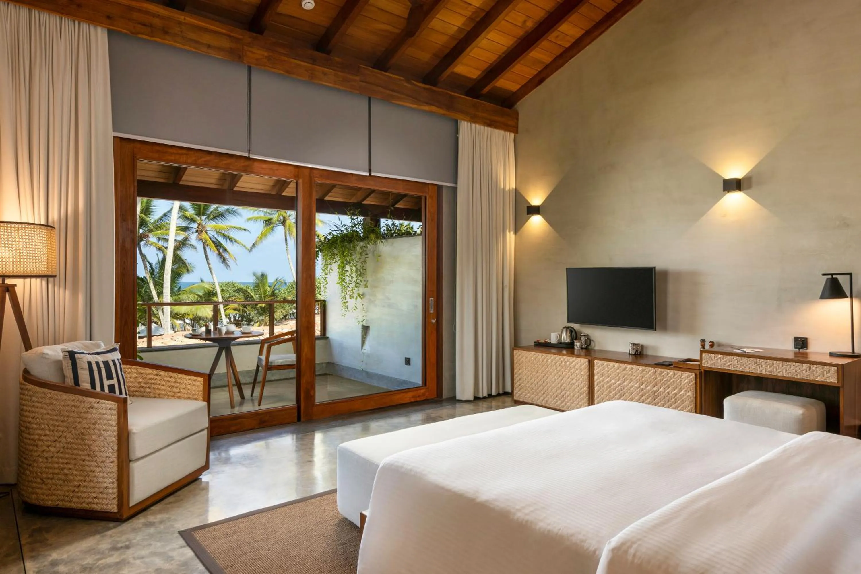 Seating area, Bed in Villa Thamburu, Bentota