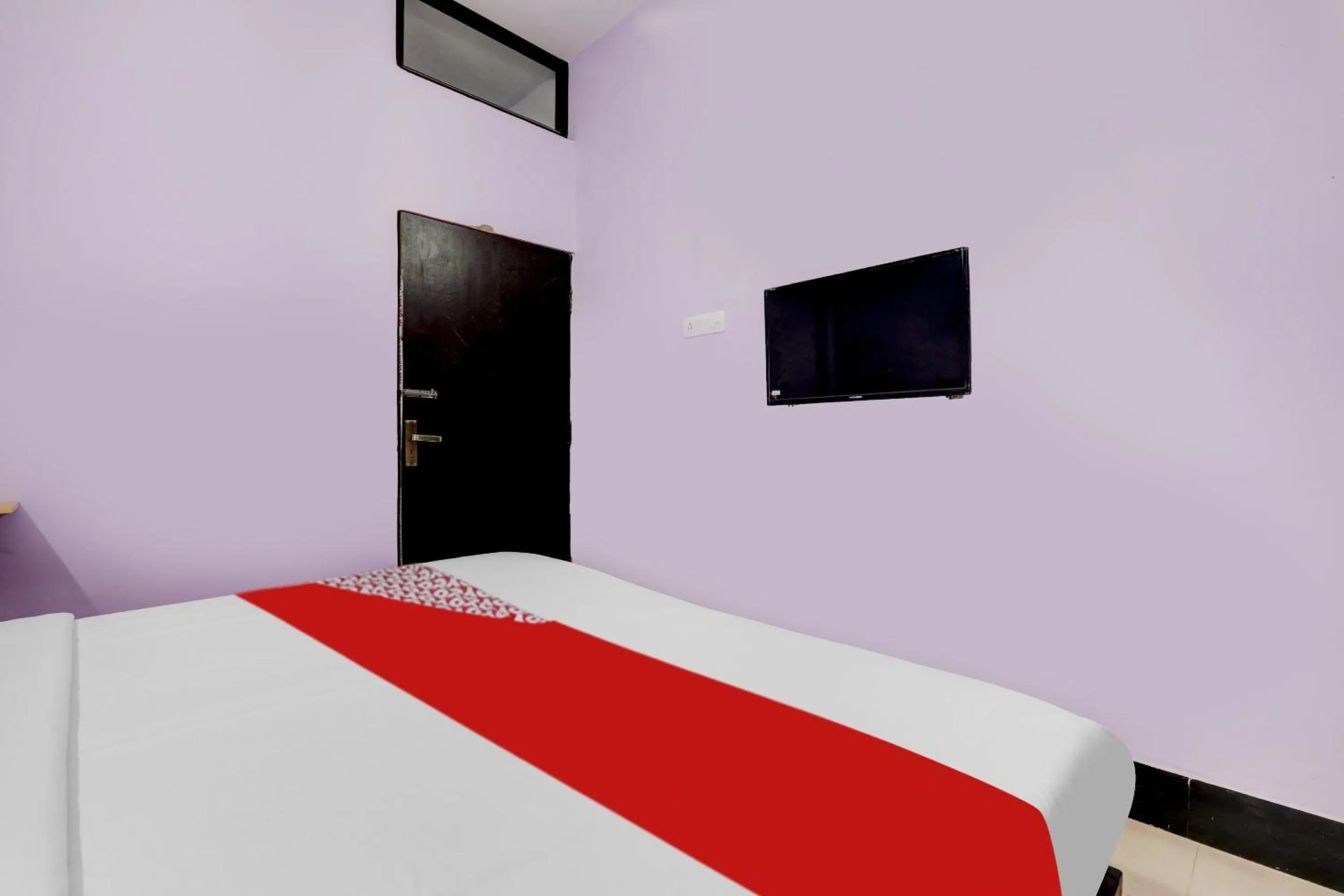 Bedroom in Hotel O SRV Palace