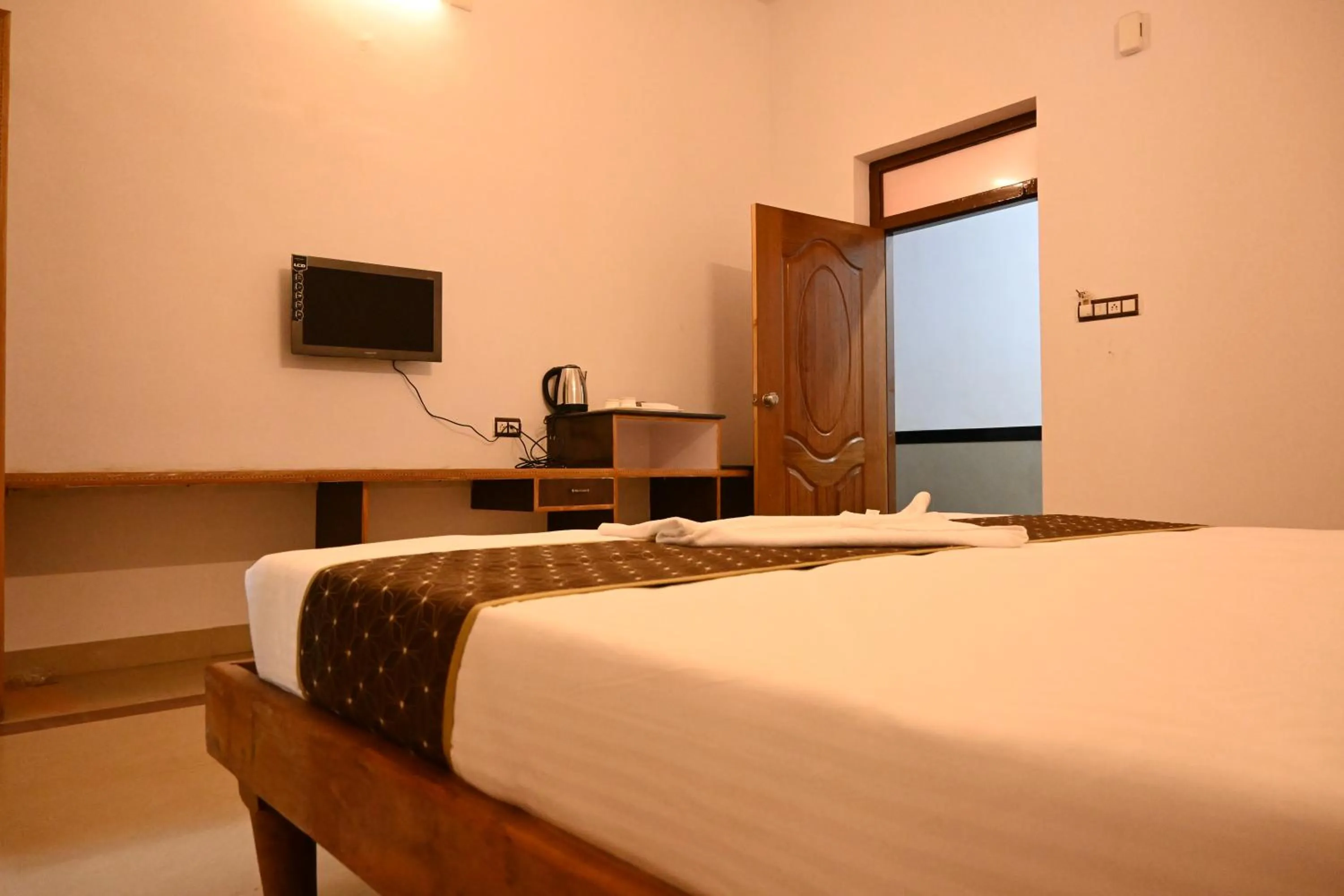 TV and multimedia, Bed in Advaitha Serenity Resorts