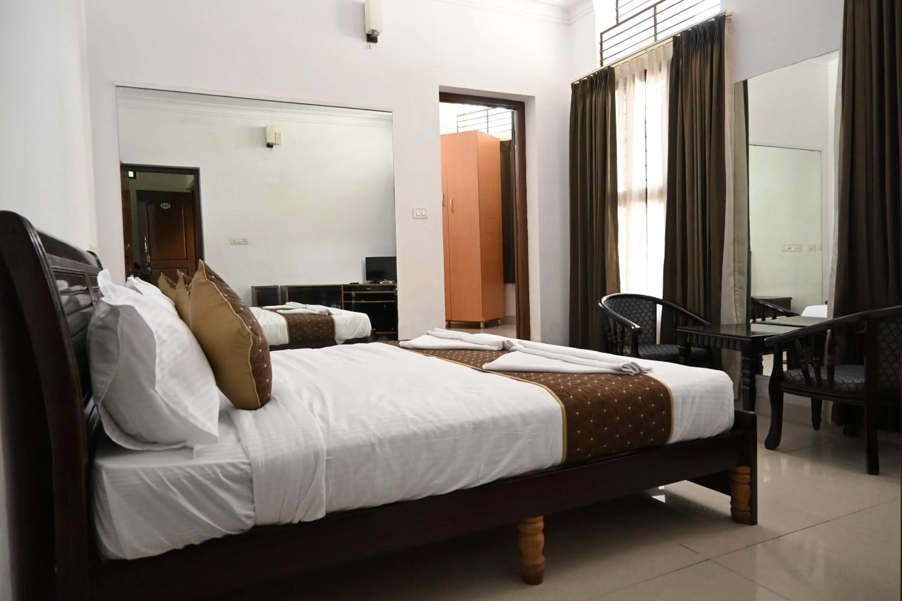 Bed in Advaitha Serenity Resorts