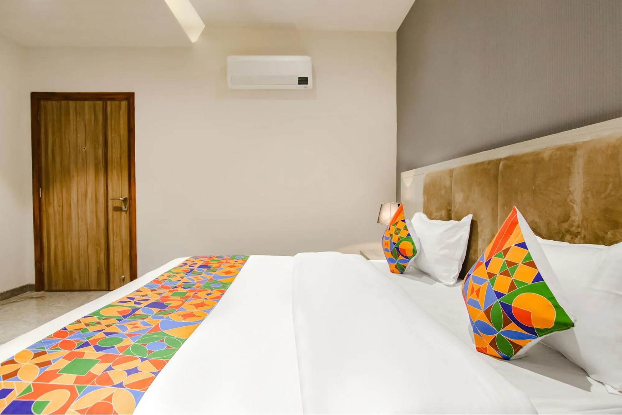 Bed in FabHotel Prime K9 Grand