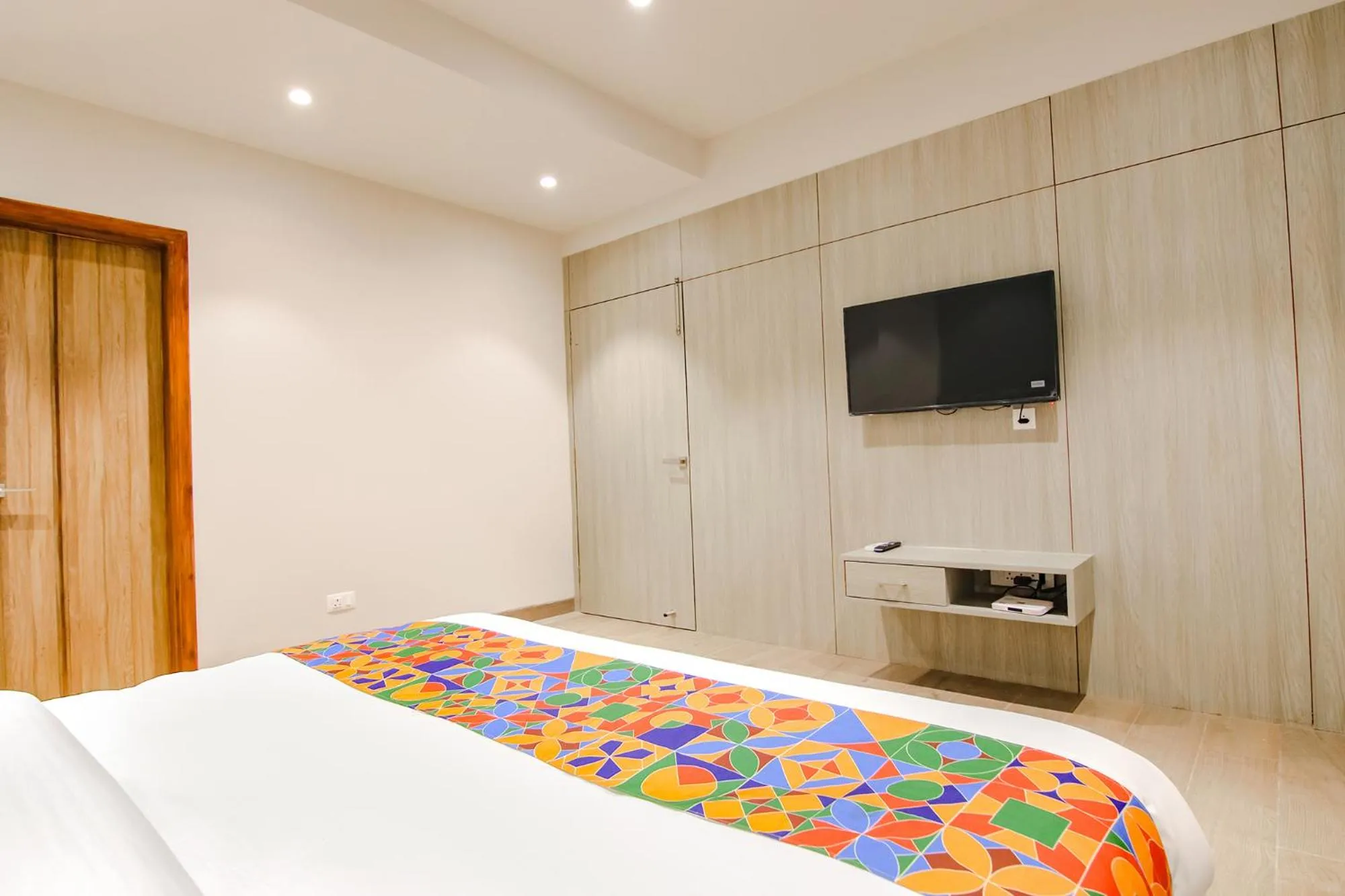 Bed in FabHotel Prime K9 Grand