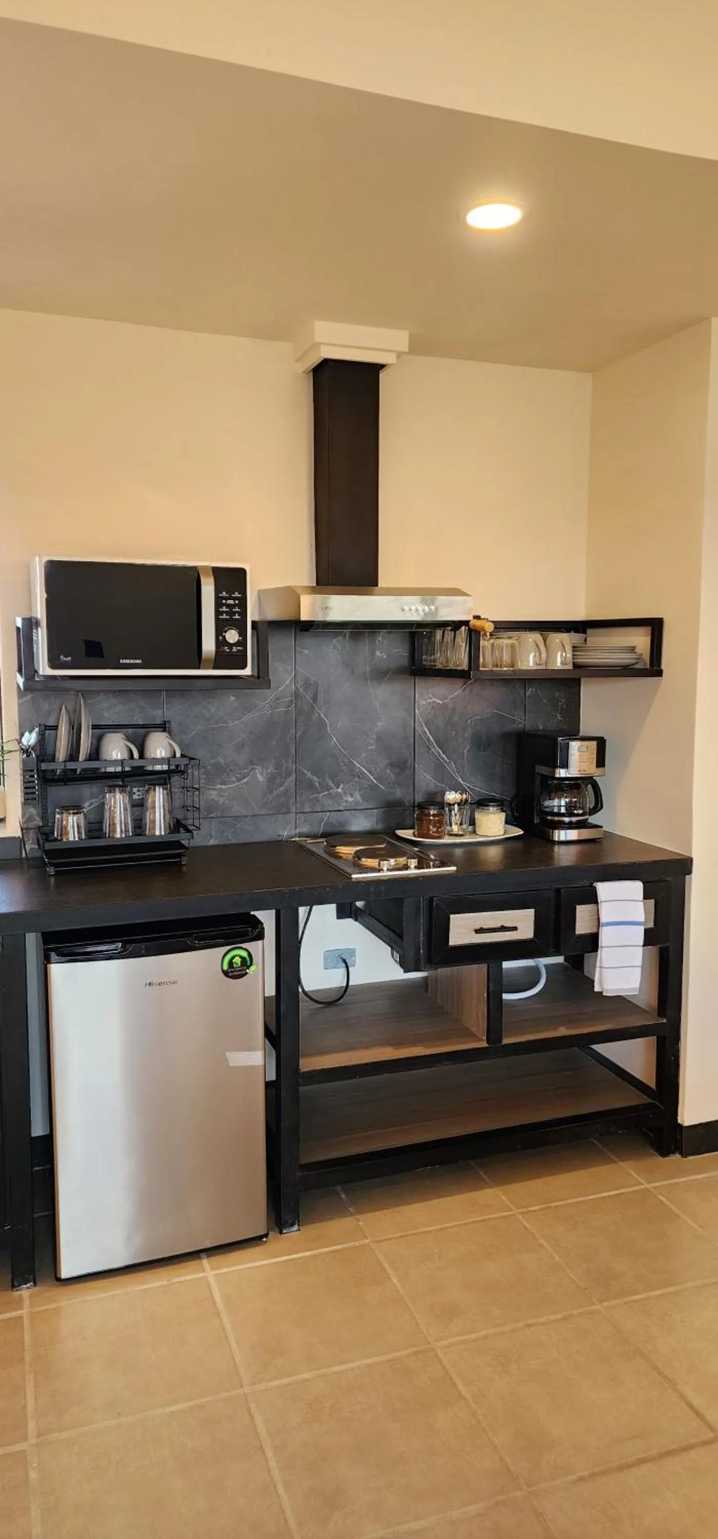 Kitchen or kitchenette in SUITES LOMBOY & PLAZA