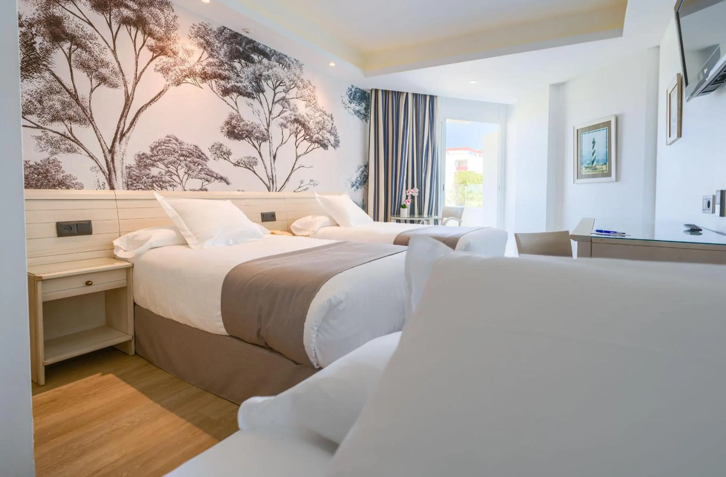 Bed in Hotel Puerto Bahía & Spa