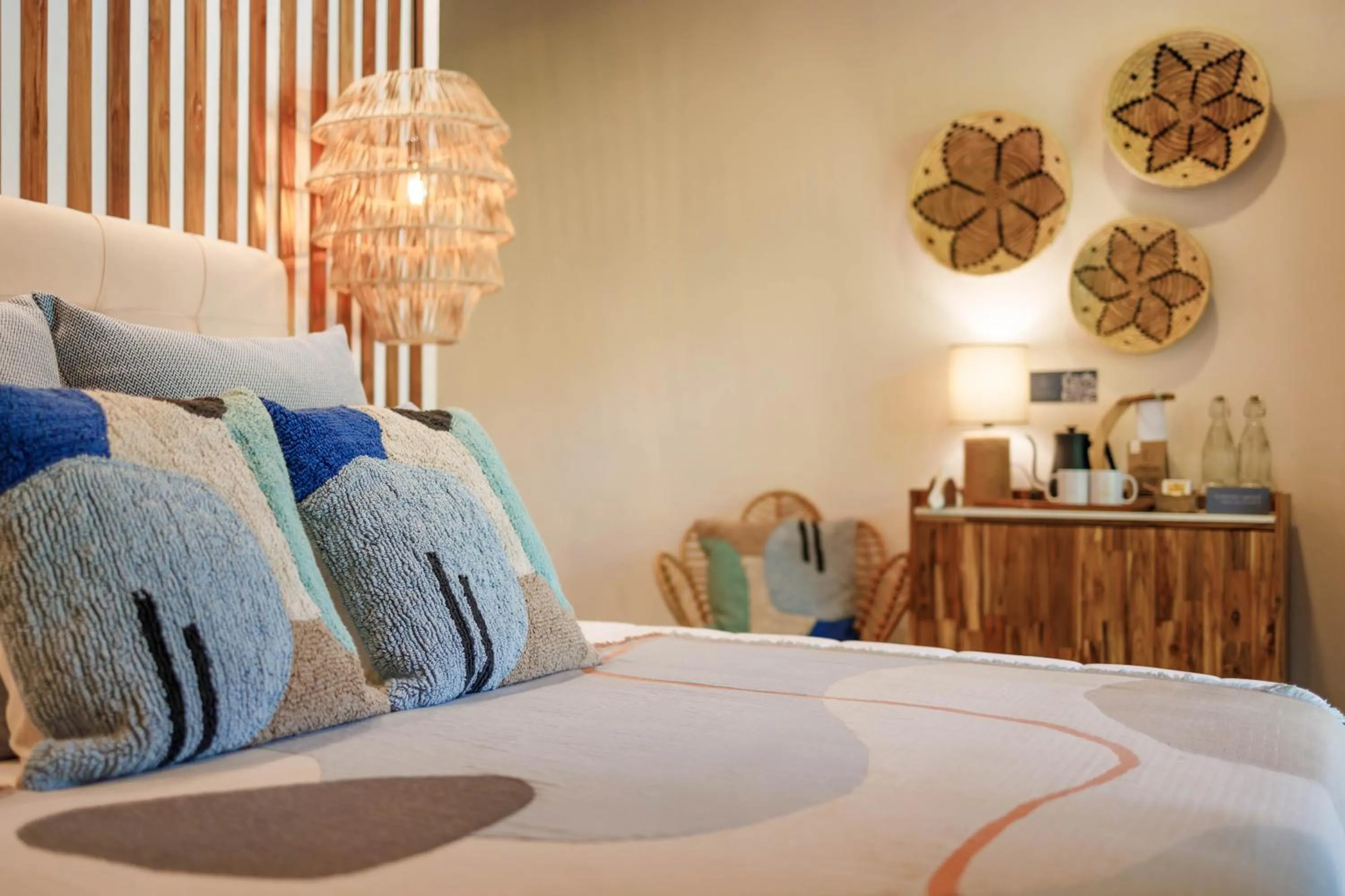 Bed in Exōtico Beach Hotel