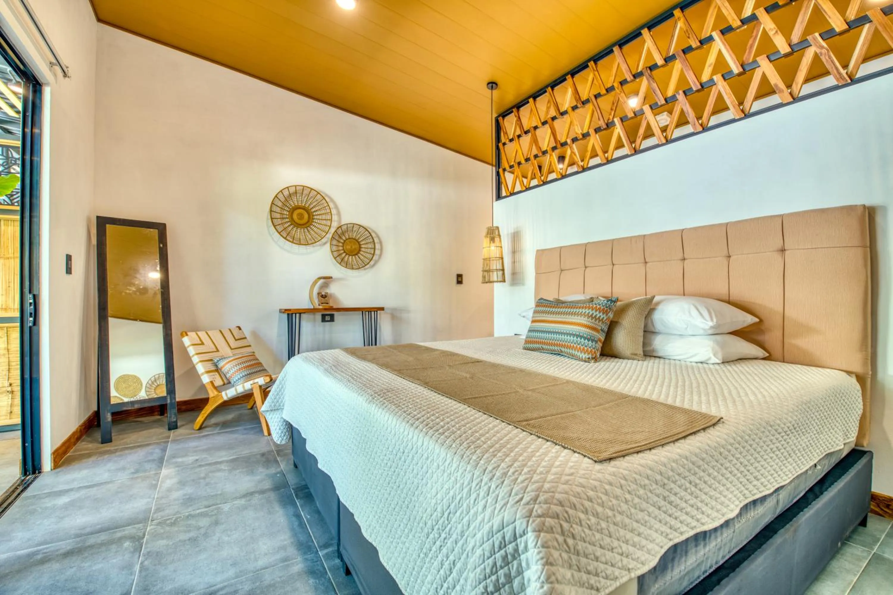 Bed in Exōtico Beach Hotel