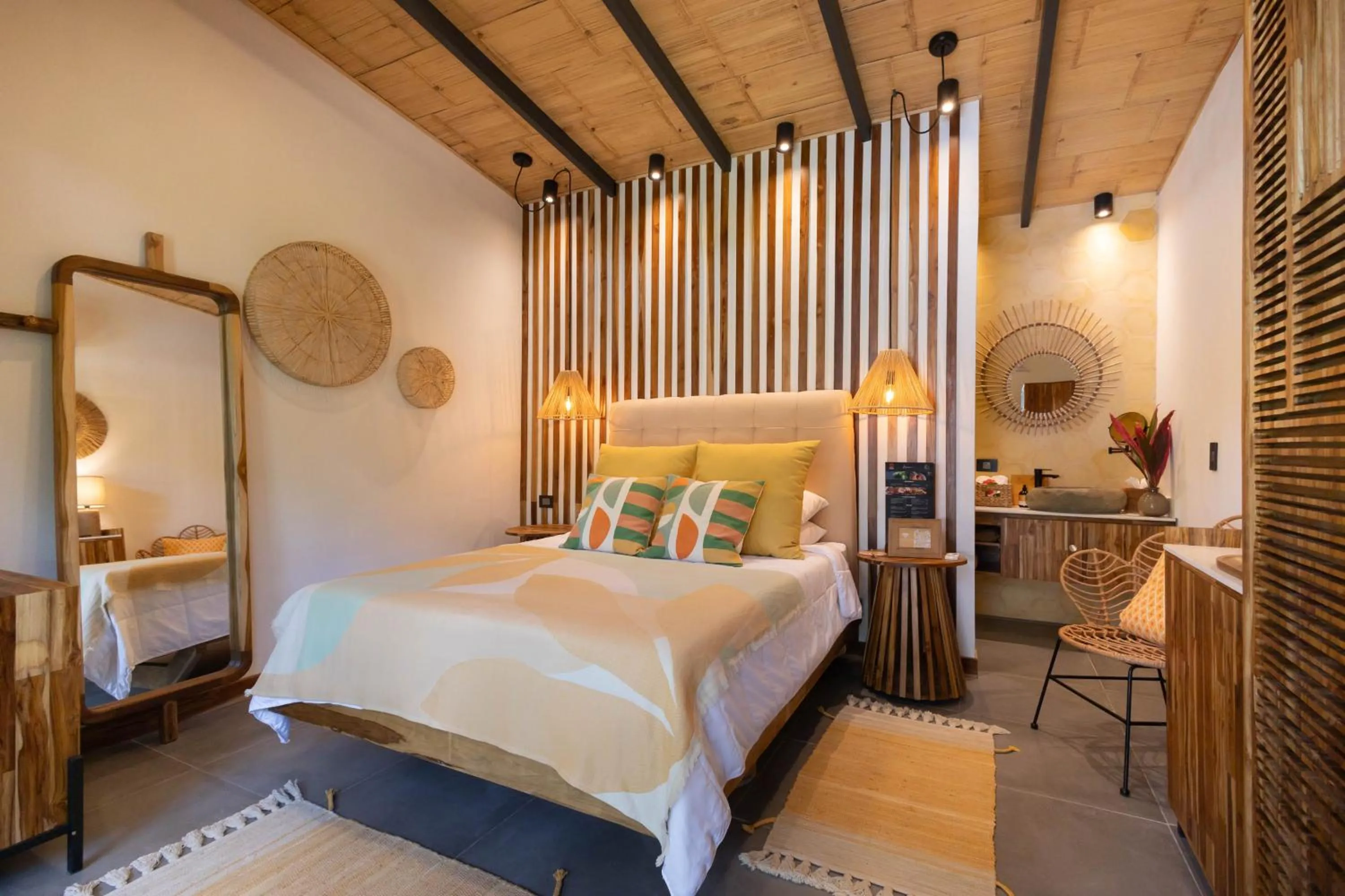 Bed in Exōtico Beach Hotel