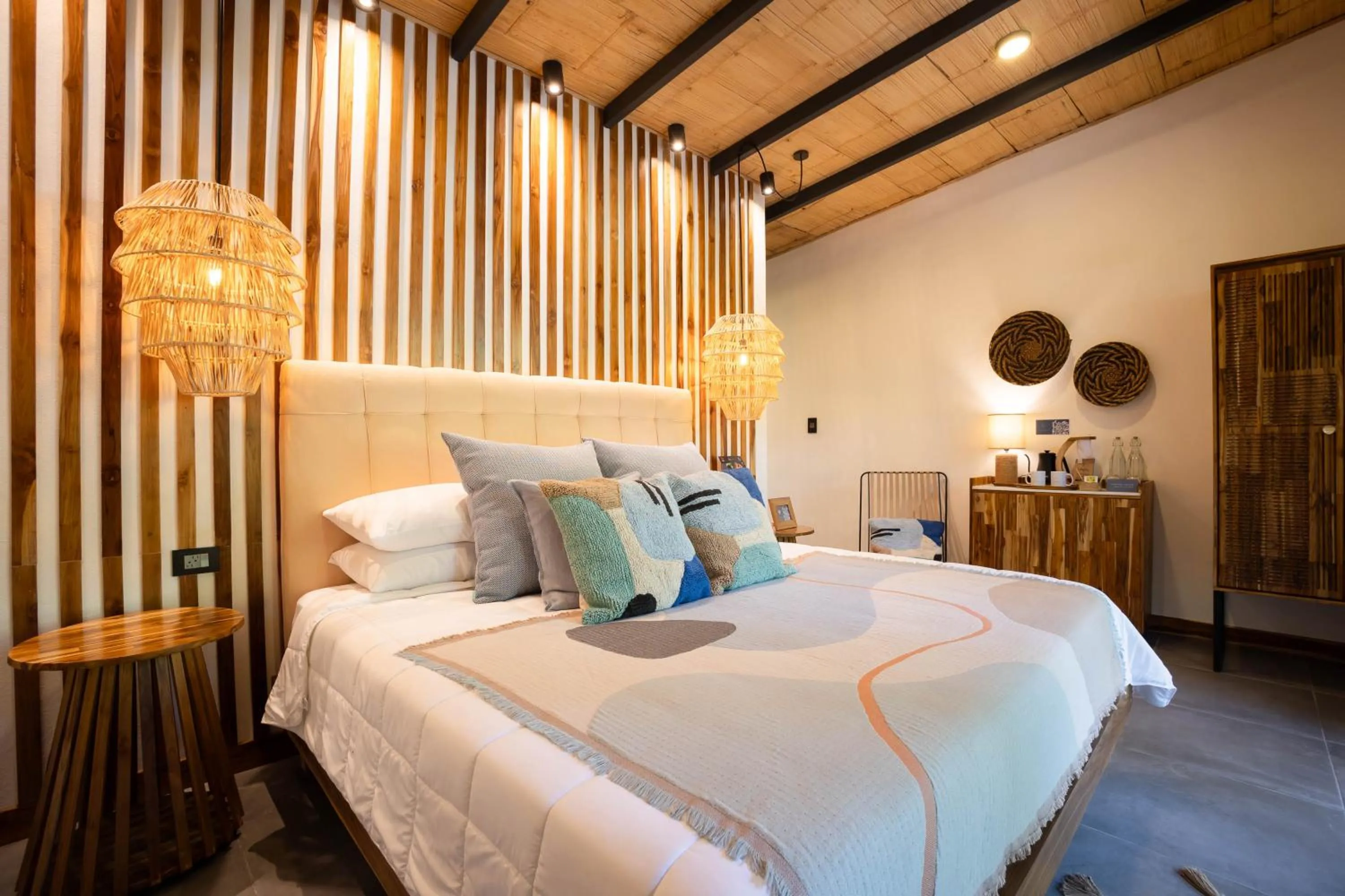 Bed in Exōtico Beach Hotel