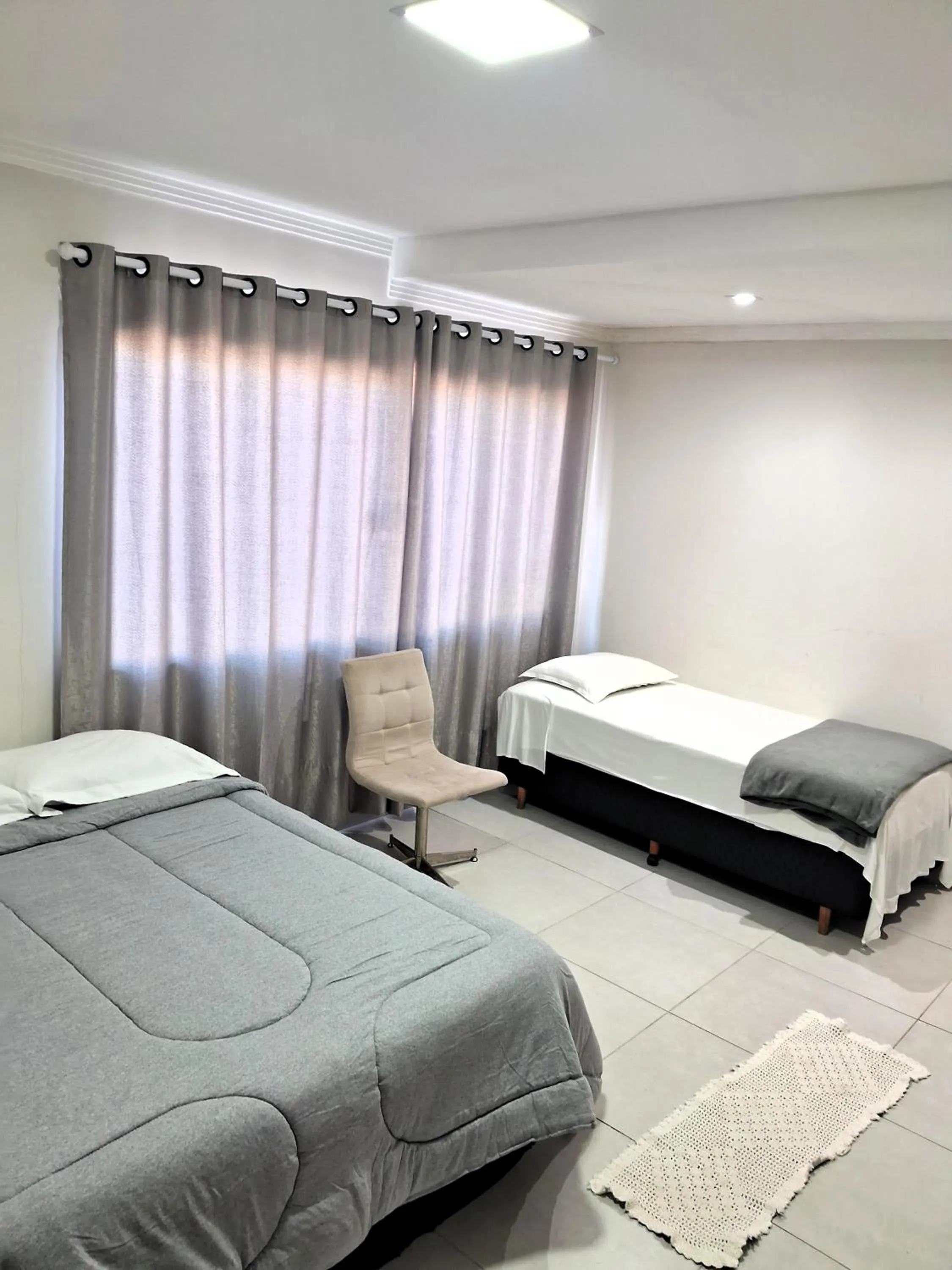 Bed in Pousada Castelo do Rei