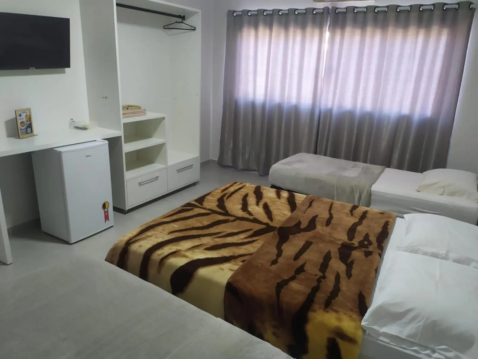 Bed in Pousada Castelo do Rei