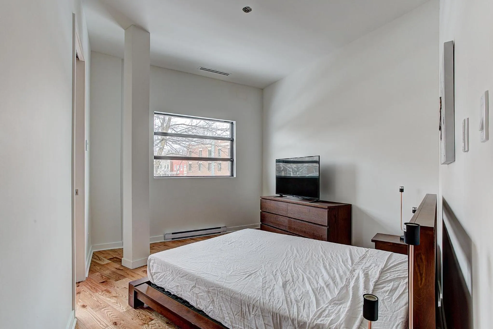 Bed in Modern Suites in NDG