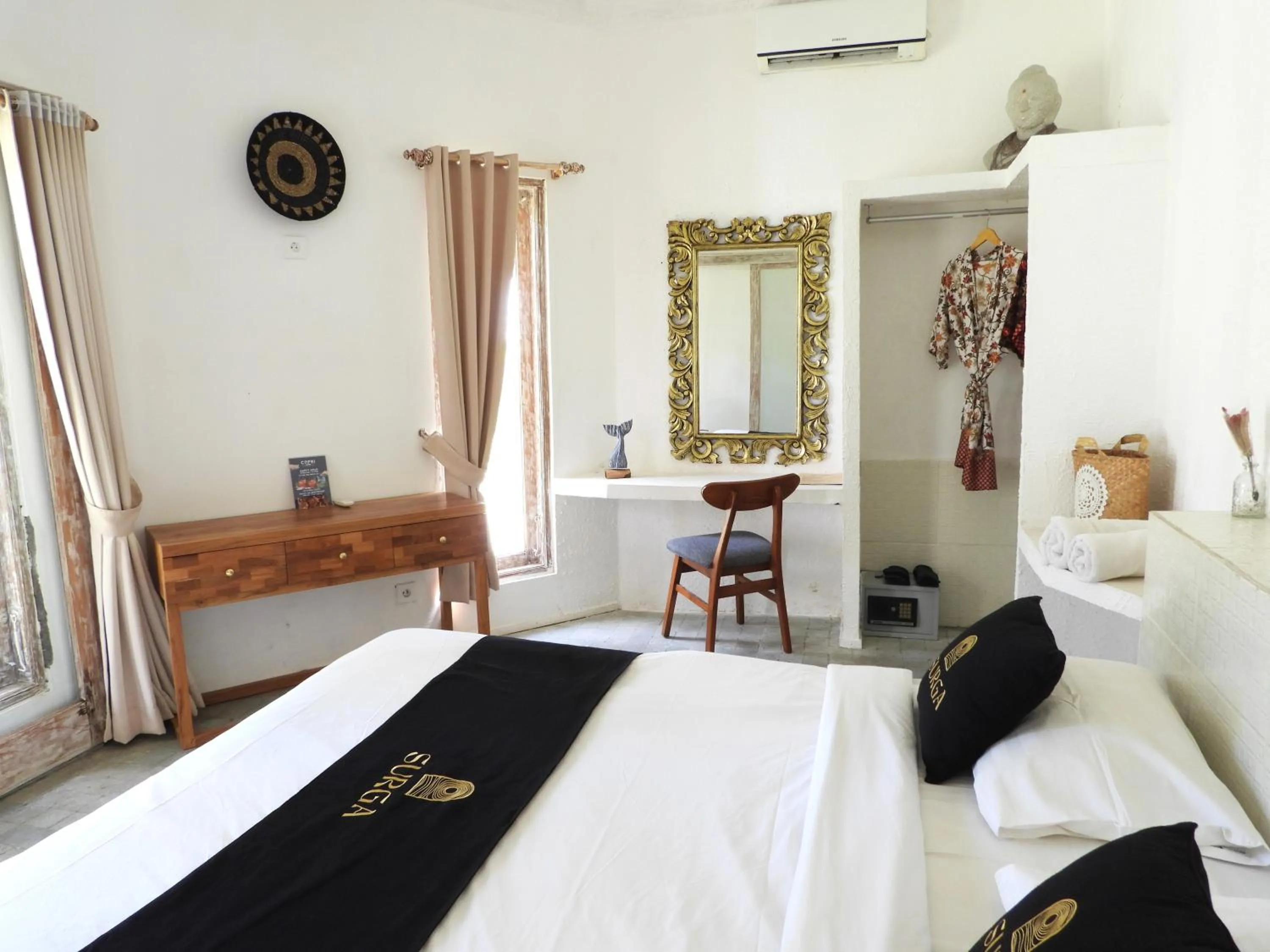 Photo of the whole room, Bed in Surga Homestay