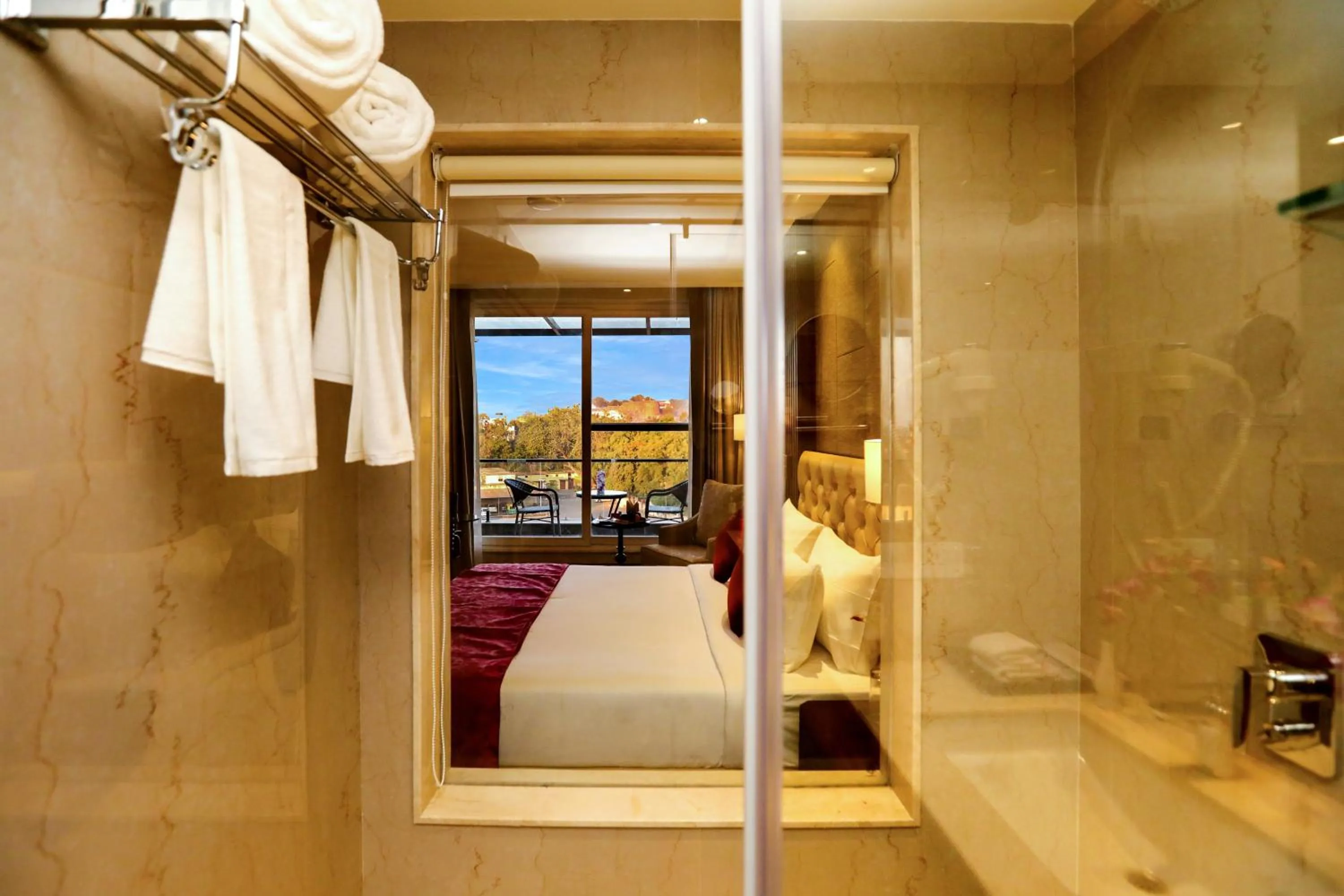 Bedroom, Bed in Regenta Place Jhansi by Royal Orchid Hotels Limited