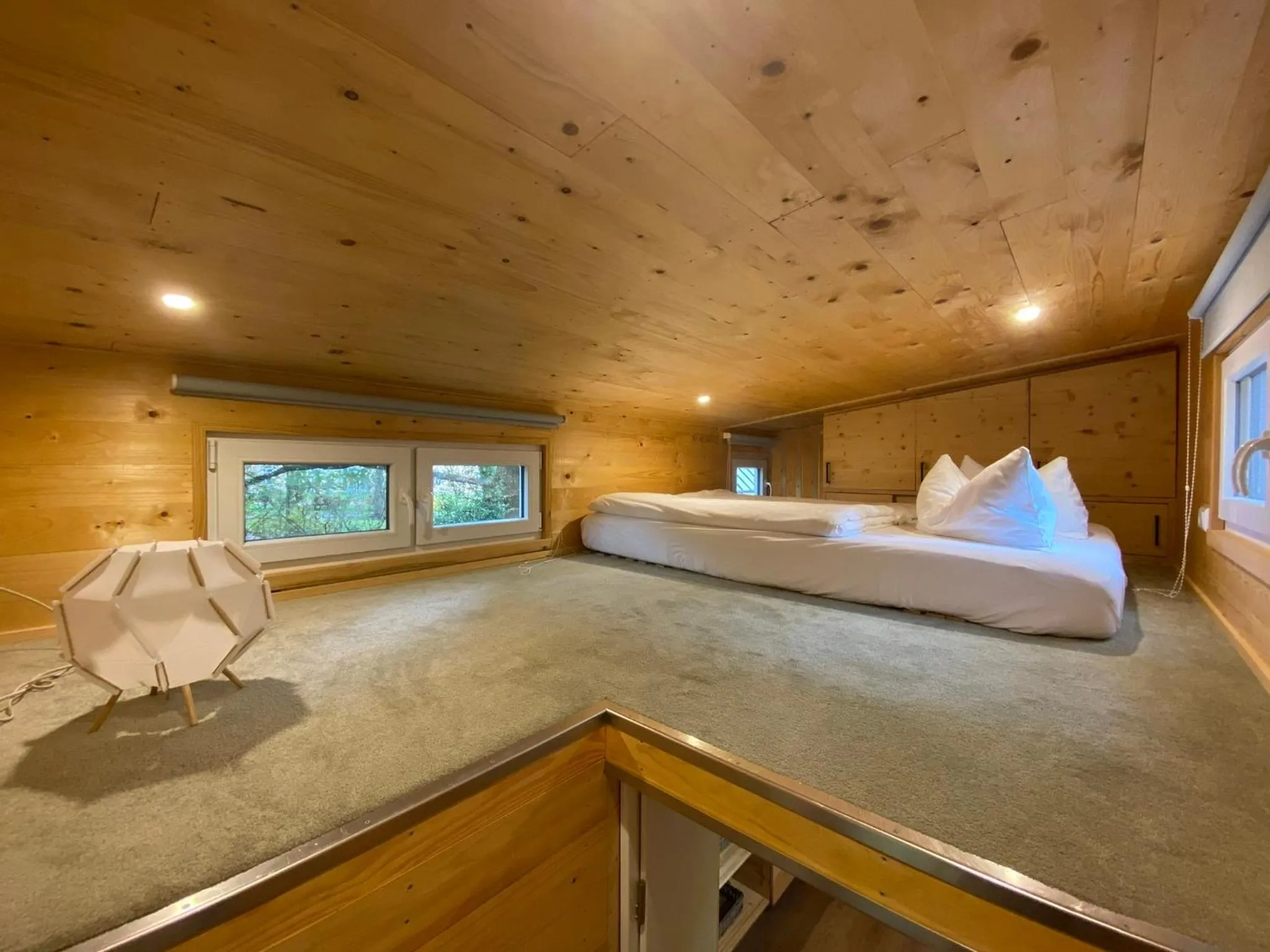 Bed in Tiny House Wupper im PIER9 Tiny House Hotel