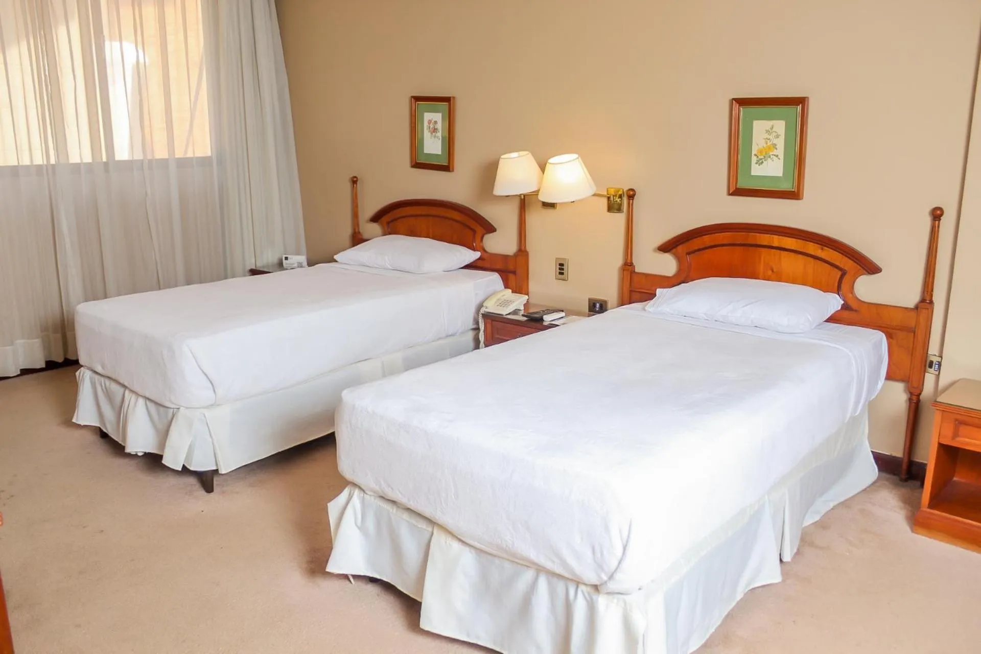 Bed in Nobile Suites Excelsior Asuncion