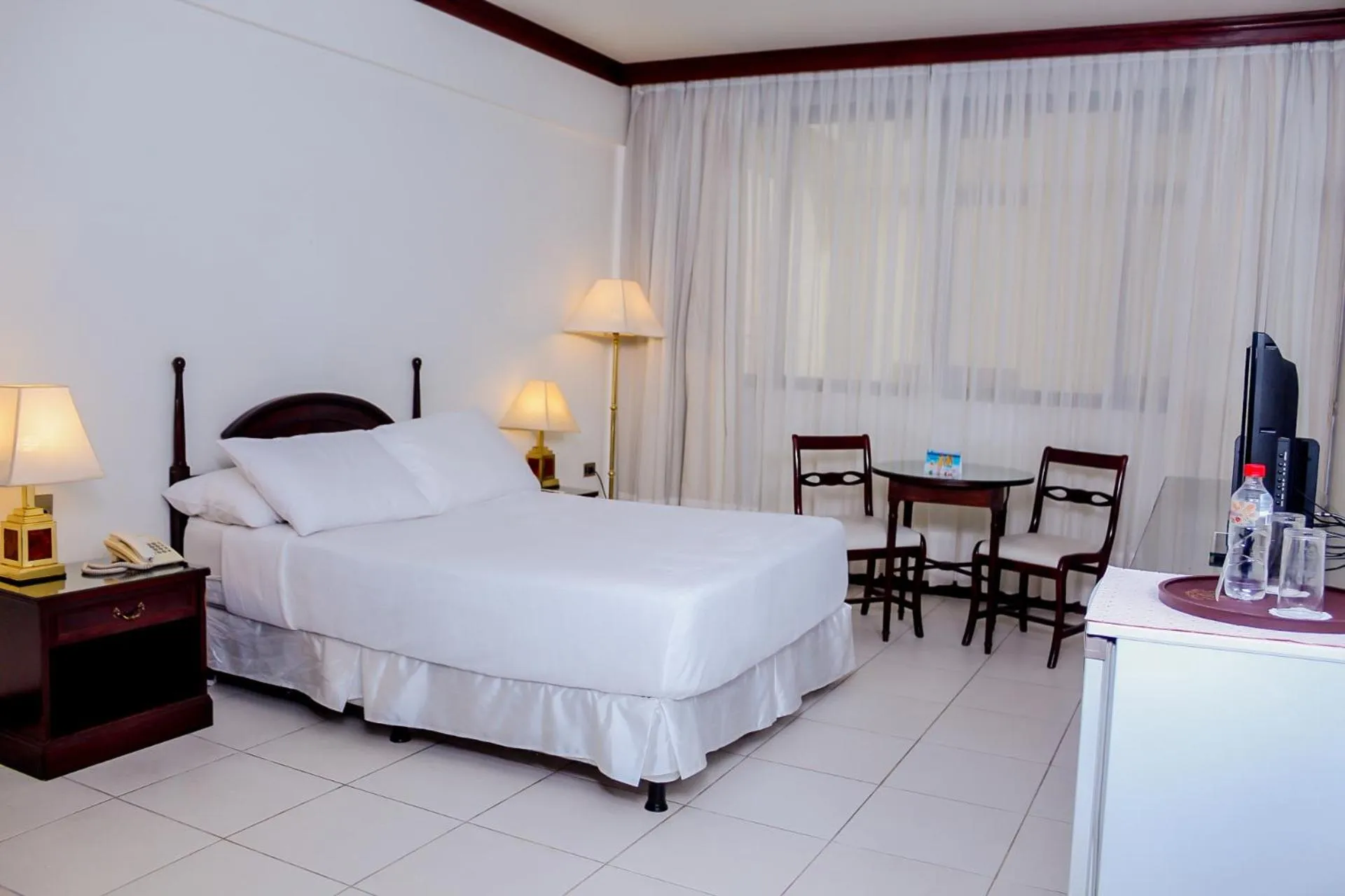 Decorative detail, Bed in Nobile Suites Excelsior Asuncion