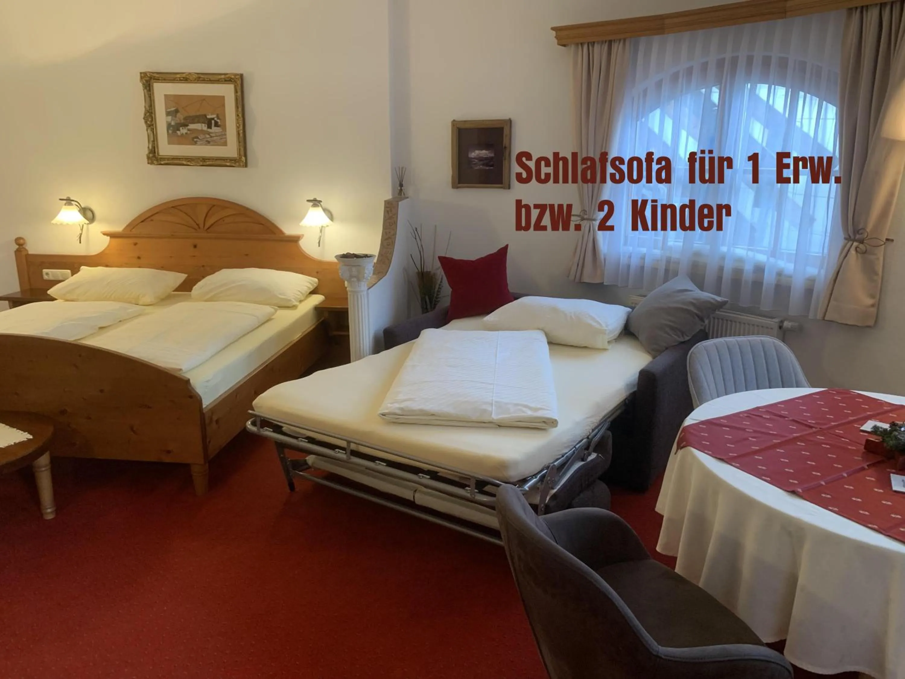 Bed in Ferienhaus Willms am Gaisberg