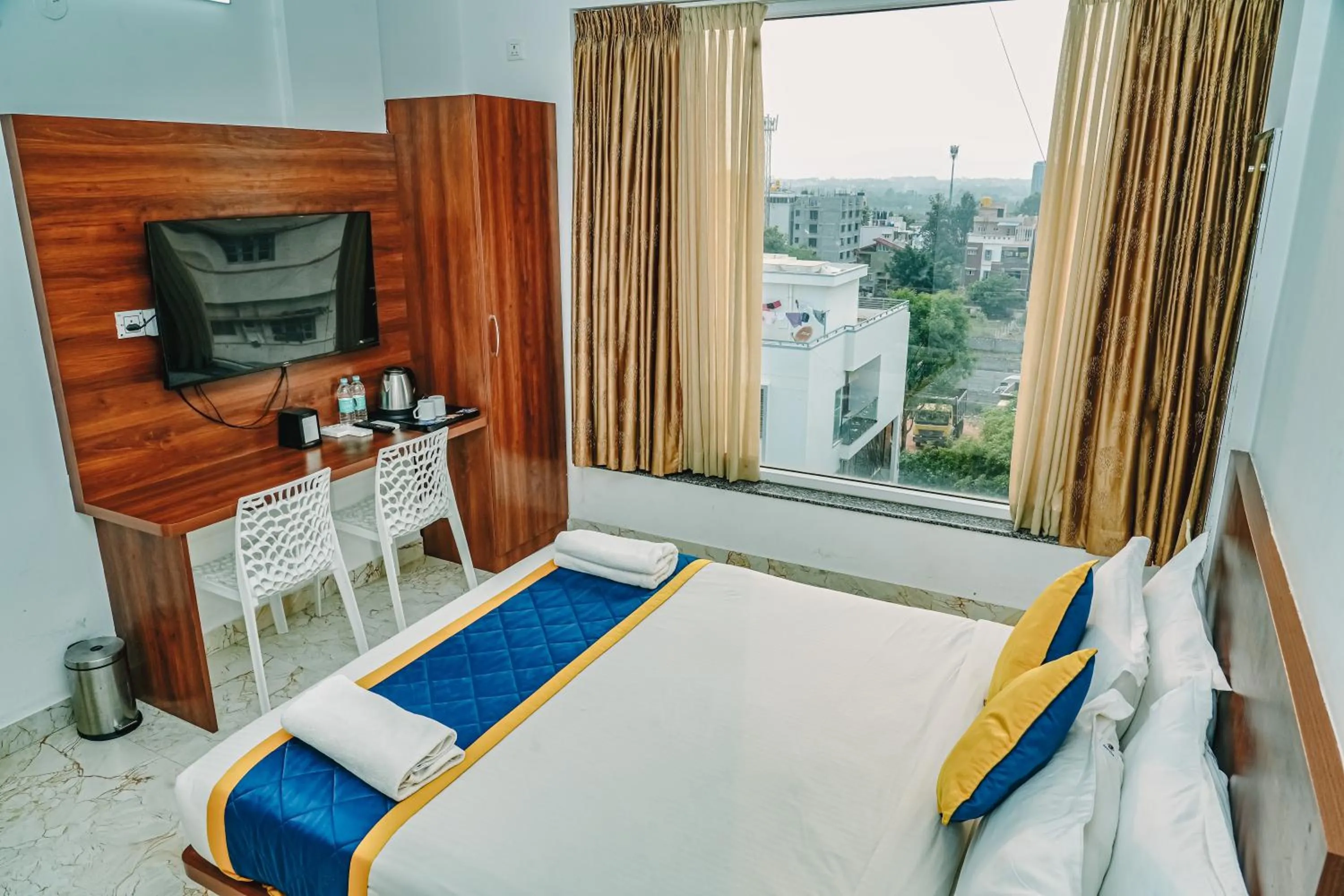 Bedroom, Bed in Keerthis Royal Suites -Bangalore Airport Budget Luxury Hotel