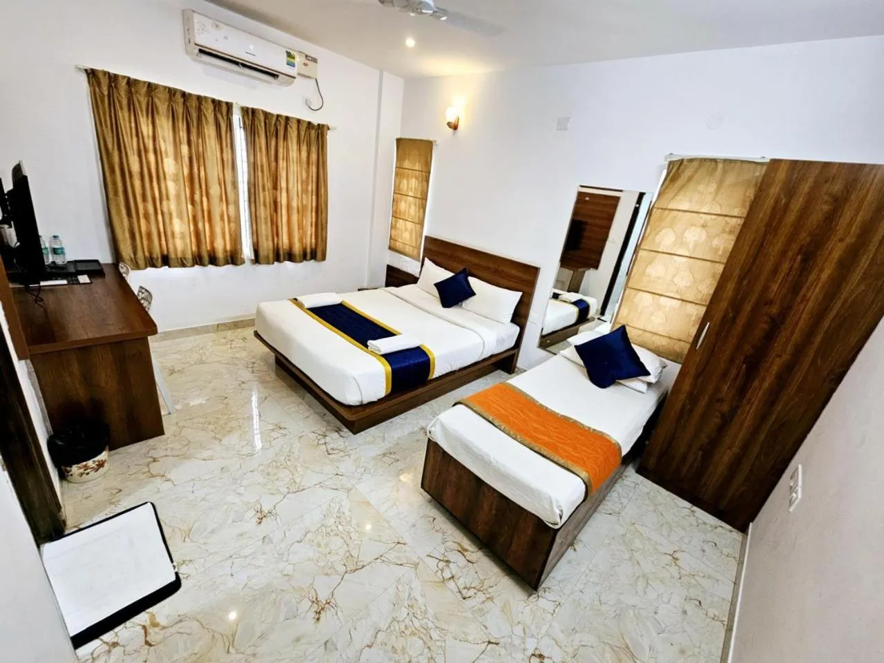 Bed in Keerthis Royal Suites Hotels in Bangalore Airport
