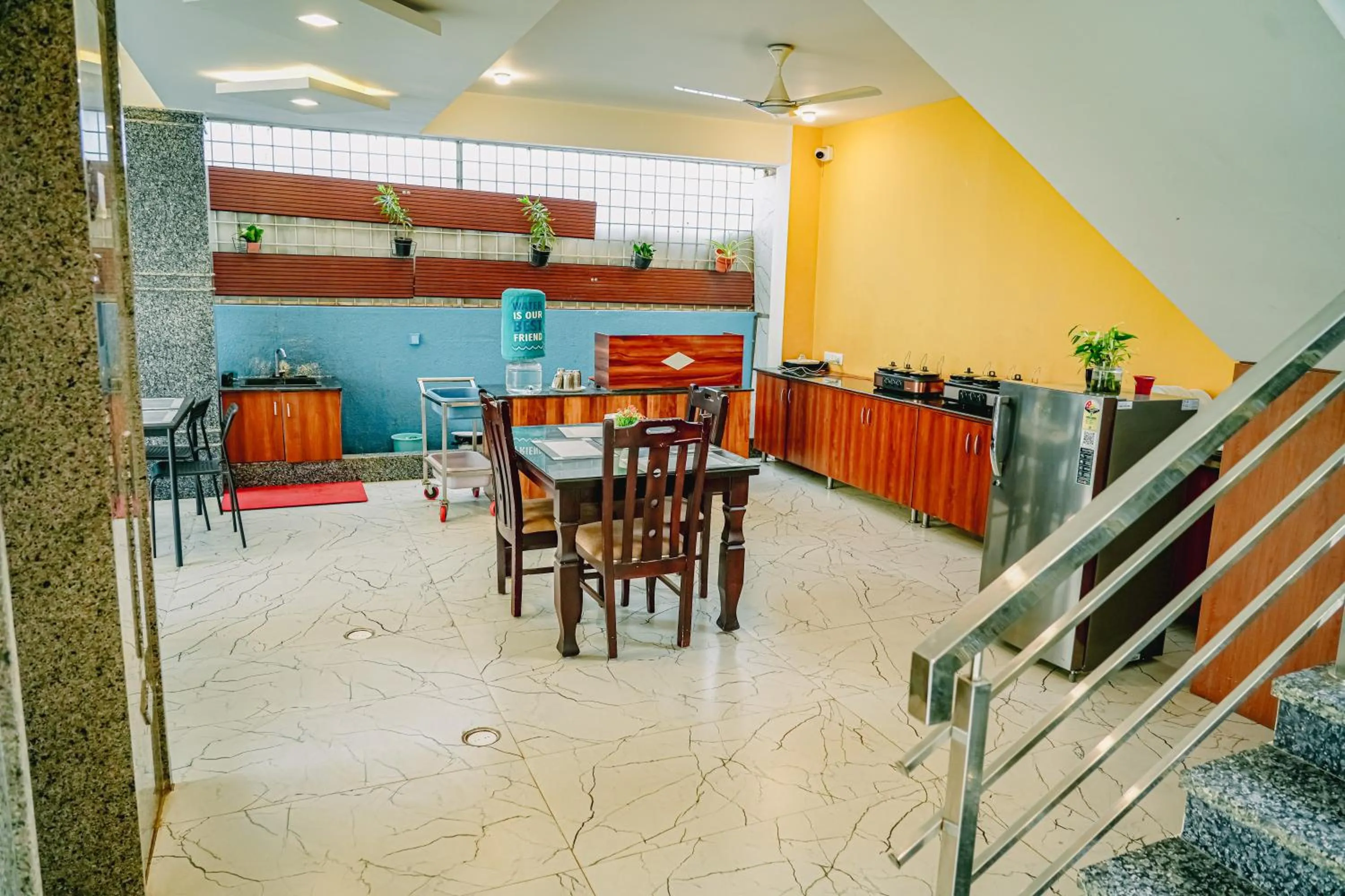 Kitchen or kitchenette in Keerthis Royal Suites -Bangalore Airport Budget Luxury Hotel