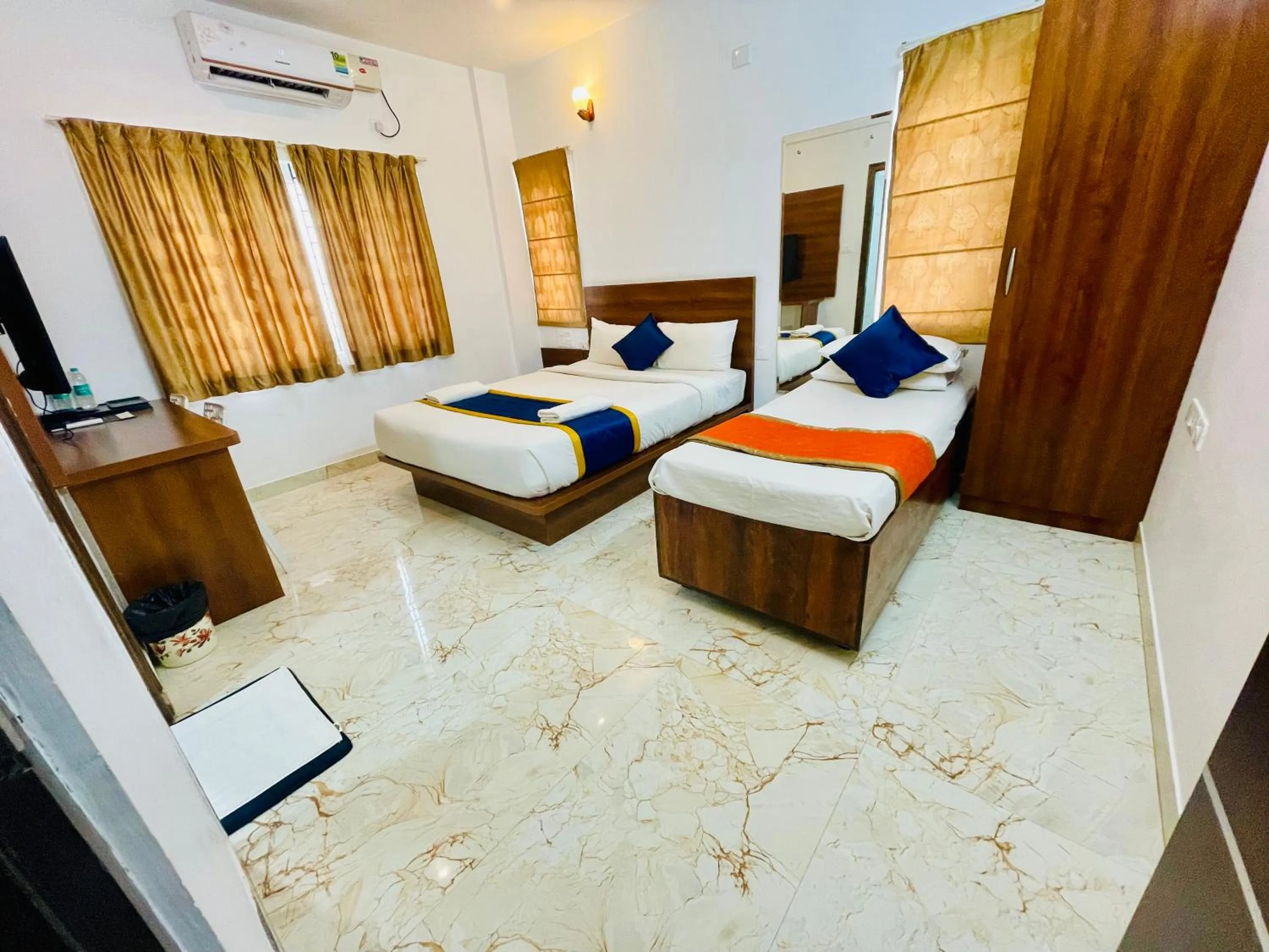 Bed in Keerthis Royal Suites Hotels in Bangalore Airport