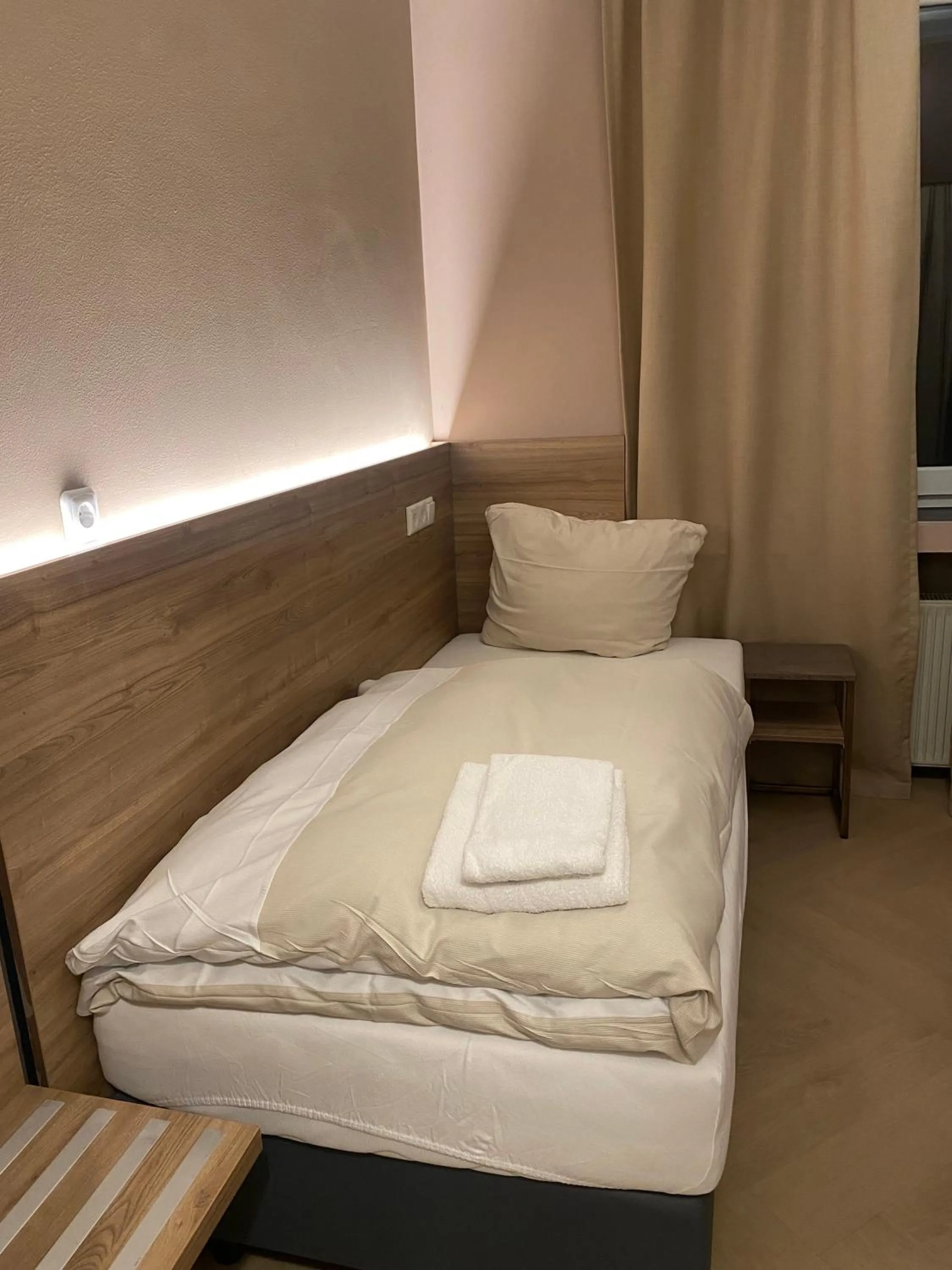 Bed in Hotel Petite Königsallee SELF CHECK-IN