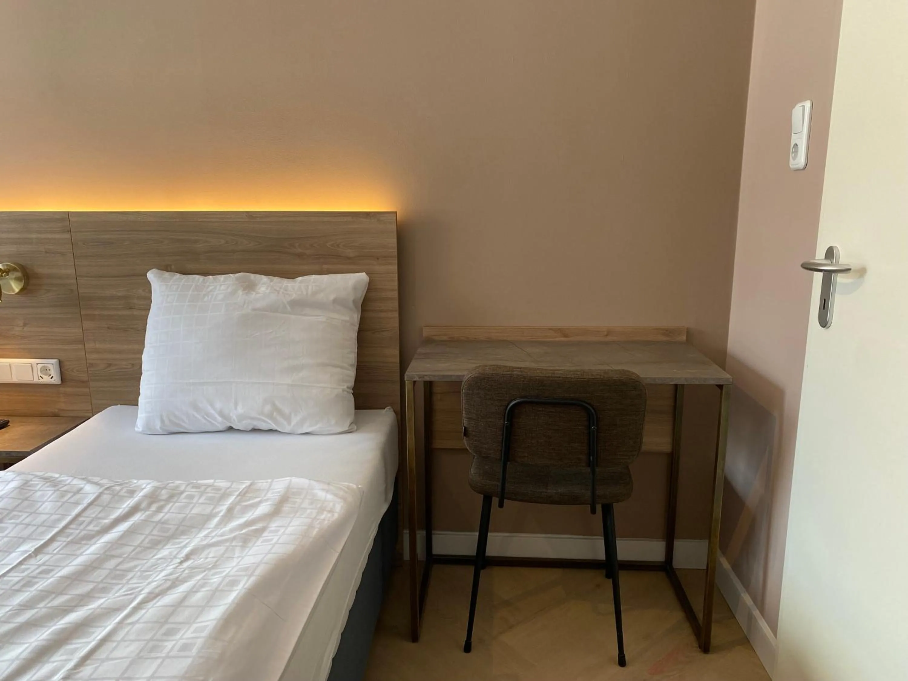 Bed in Hotel Petite Königsallee SELF CHECK-IN