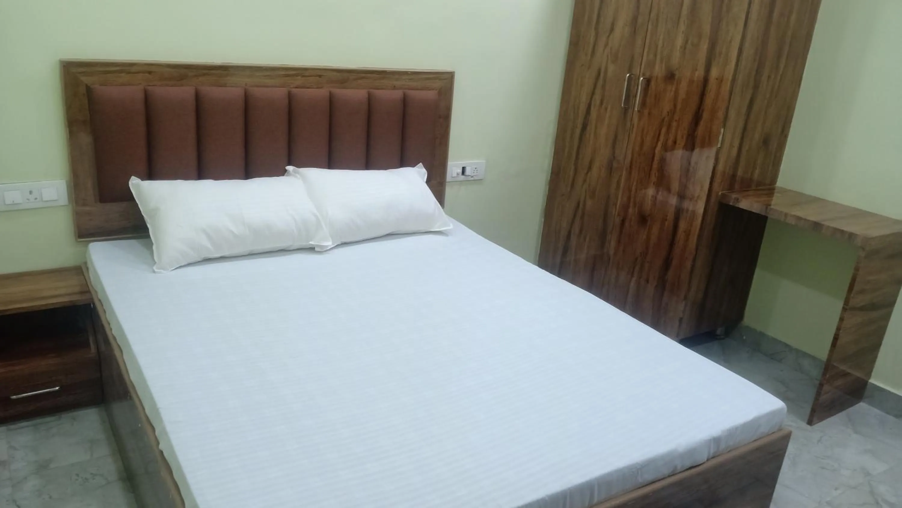 Bed in Shagun Banquet and Hotel