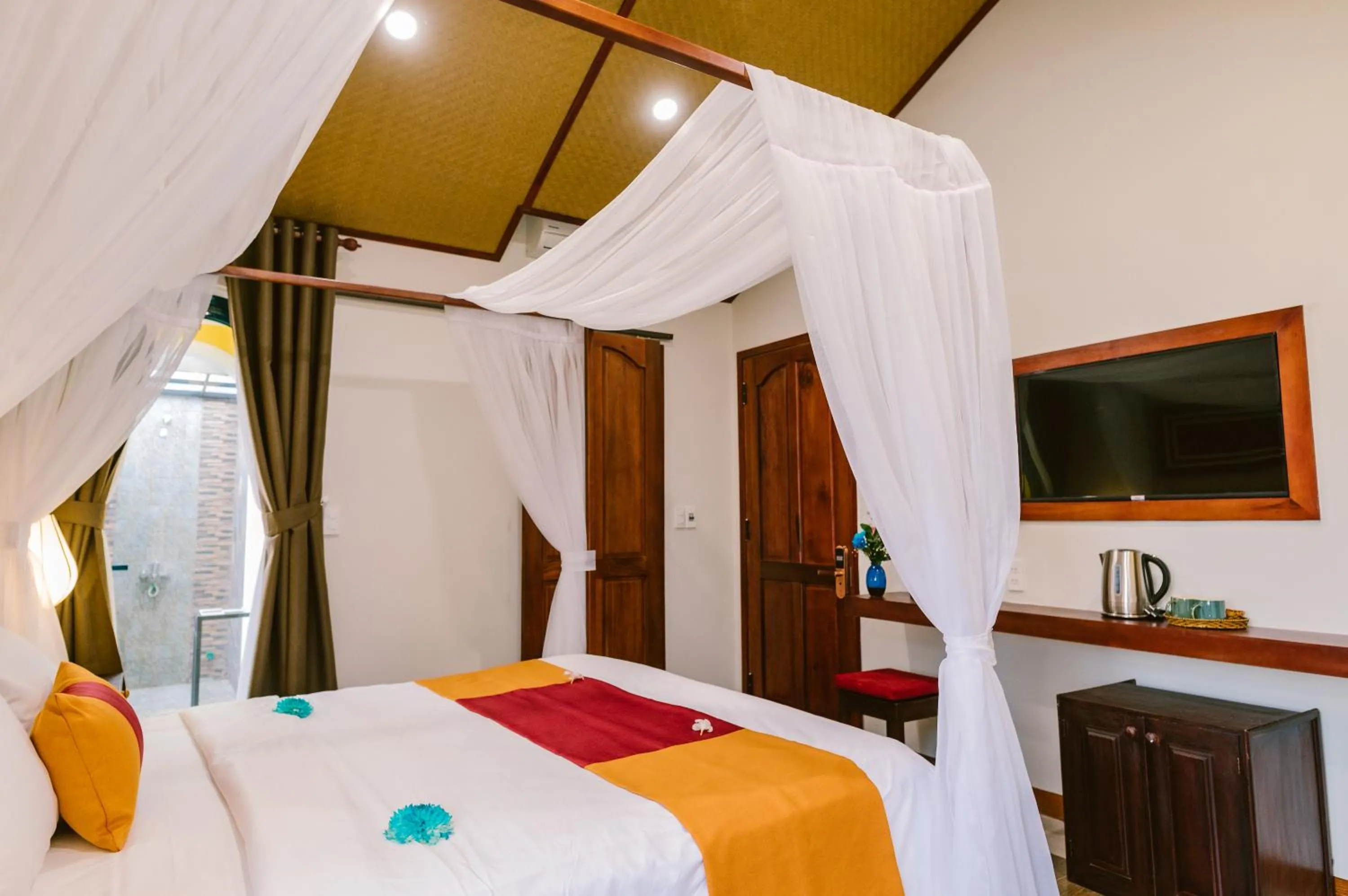 Bedroom, Bed in De'Colore Villa Hoi An