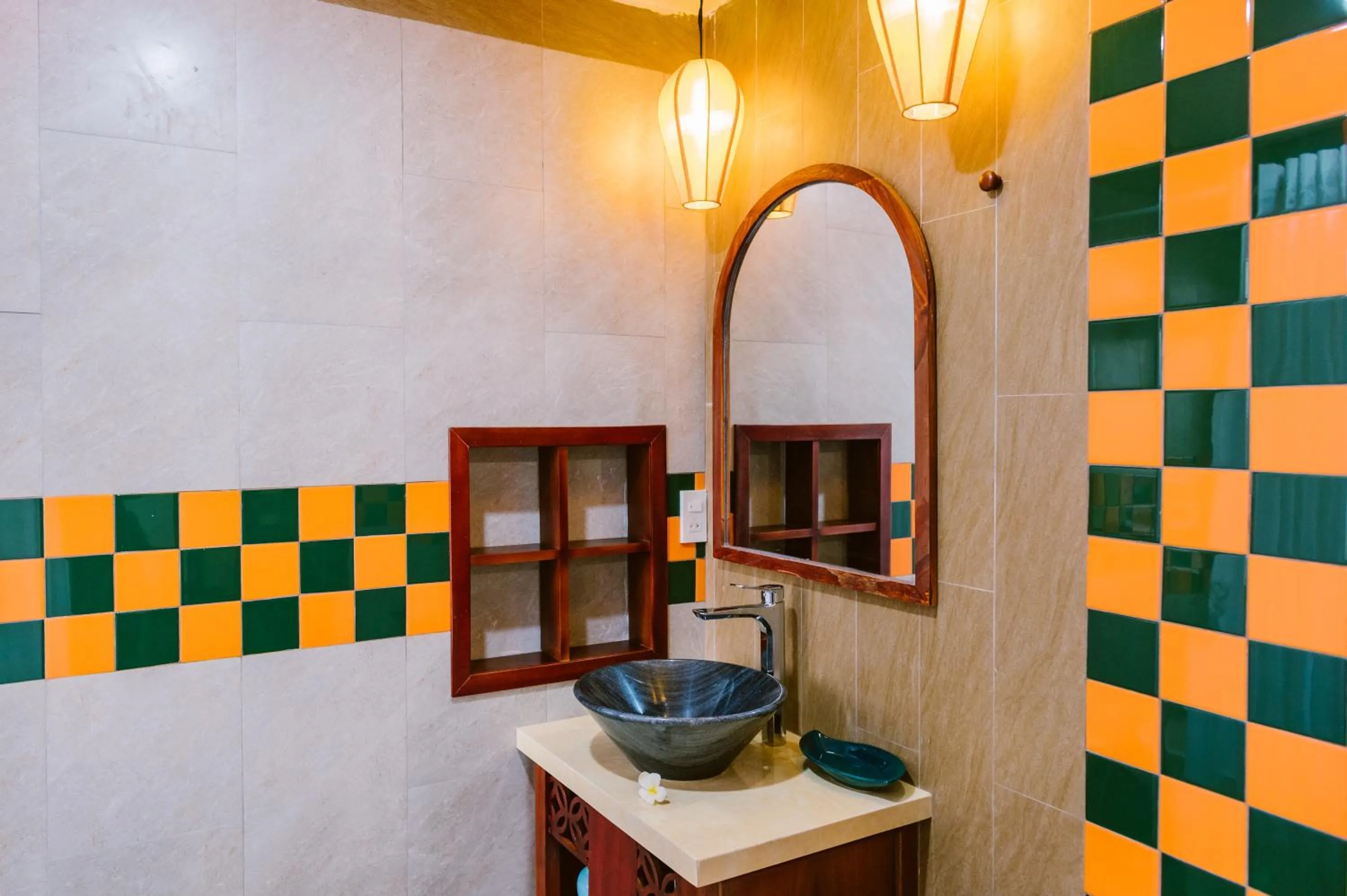 Bathroom in De'Colore Villa Hoi An