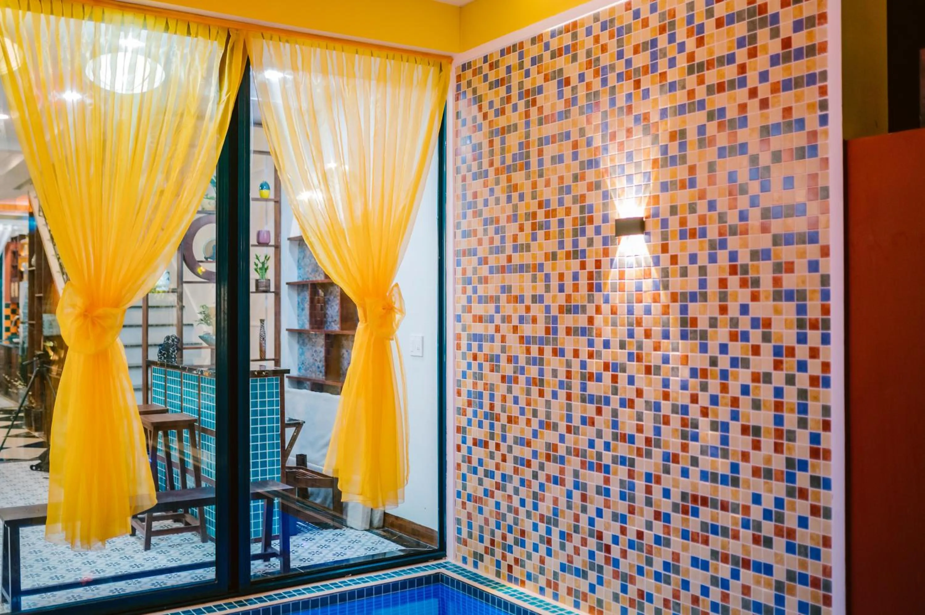 Pool view in De'Colore Villa Hoi An