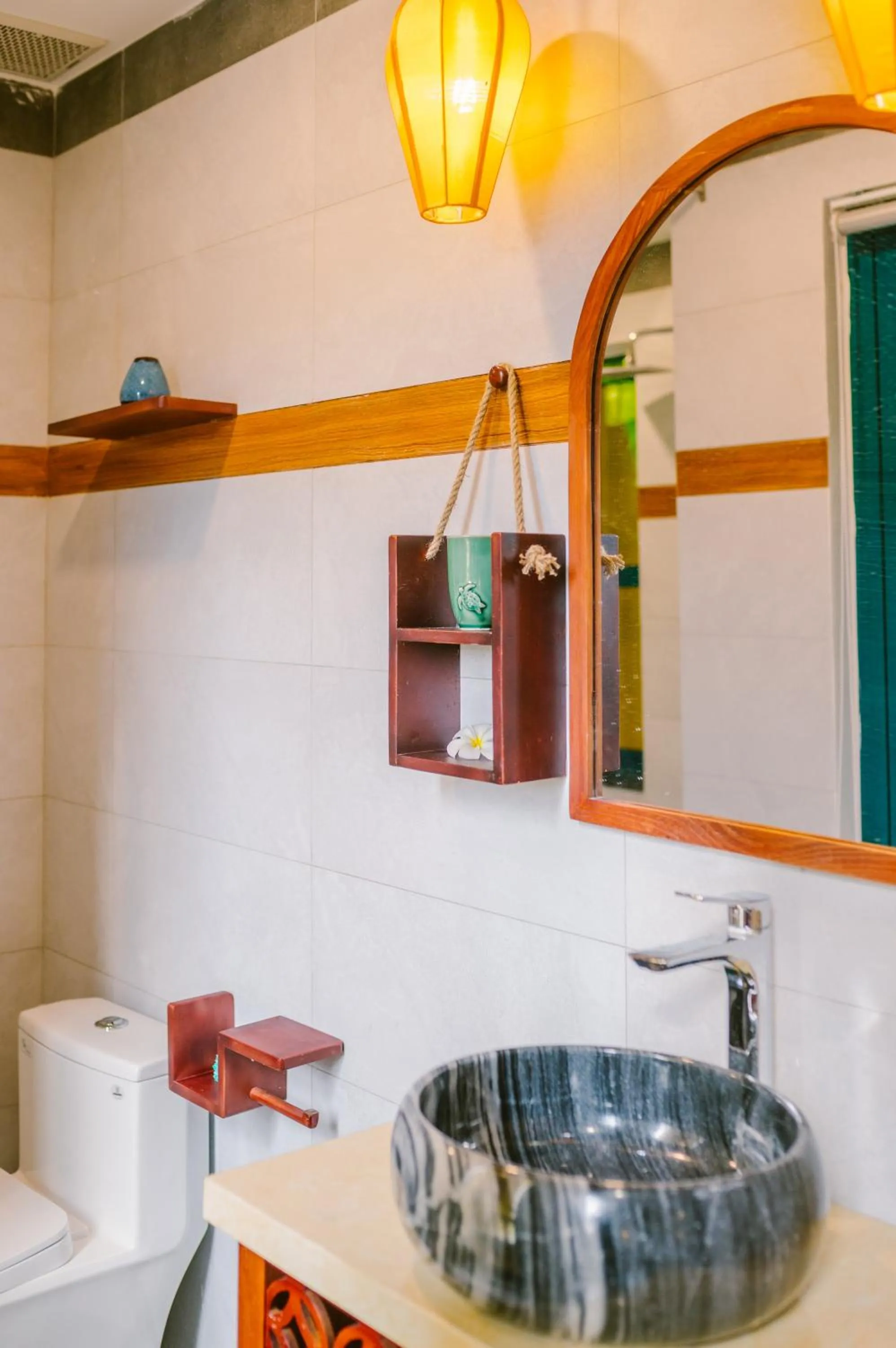Bathroom in De'Colore Villa Hoi An