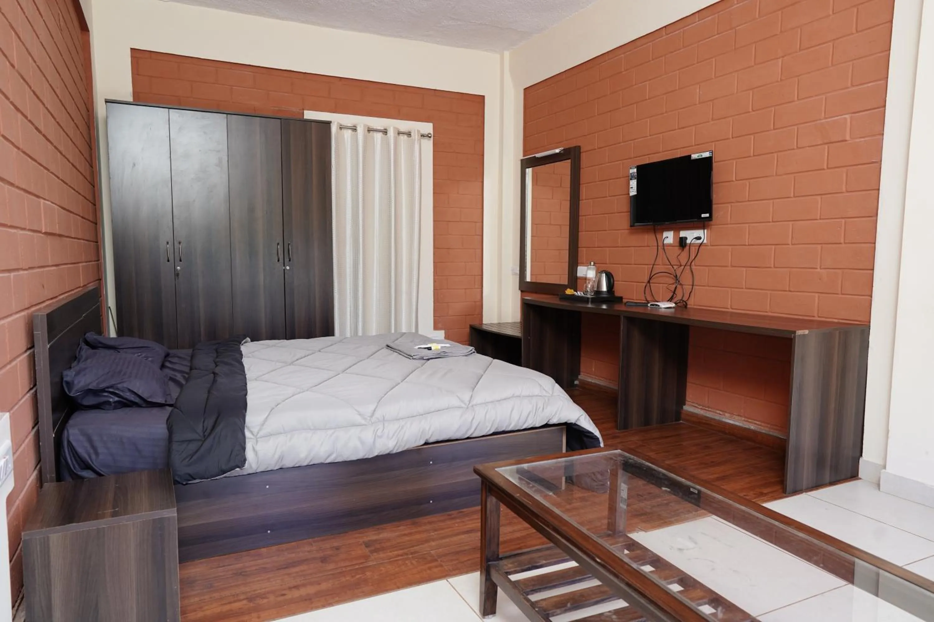 Bed in Tea Leaf Stays by Brown Tree Resorts