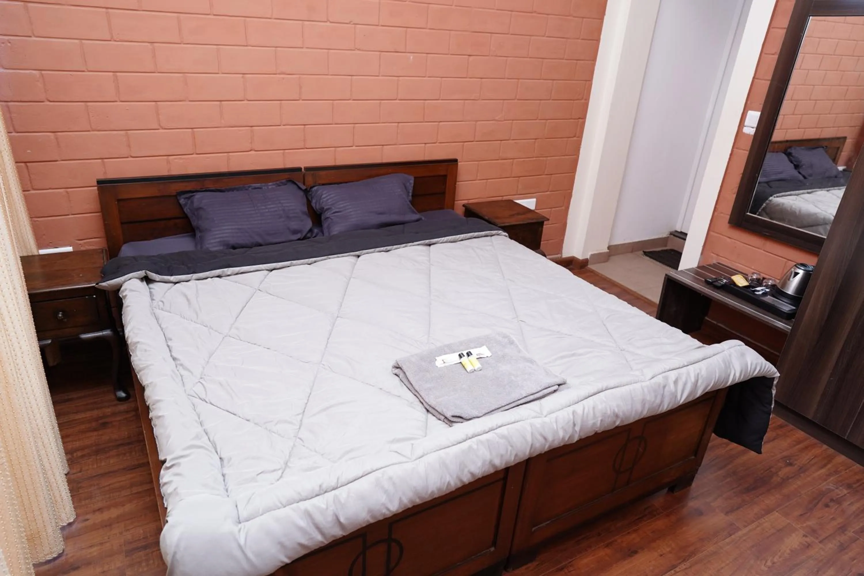 Bed in Tea Leaf Stays by Brown Tree Resorts