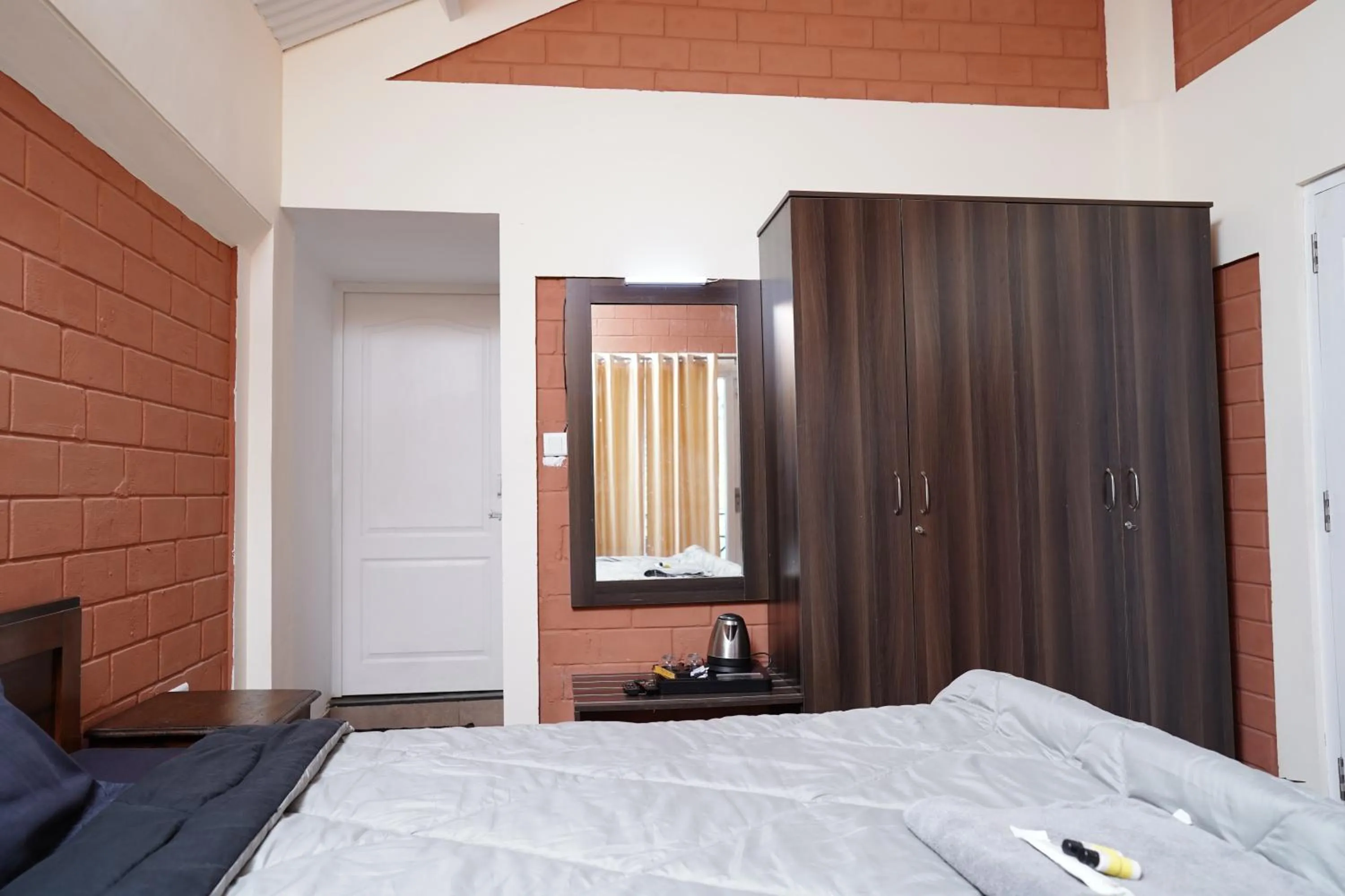 Bed in Tea Leaf Stays by Brown Tree Resorts