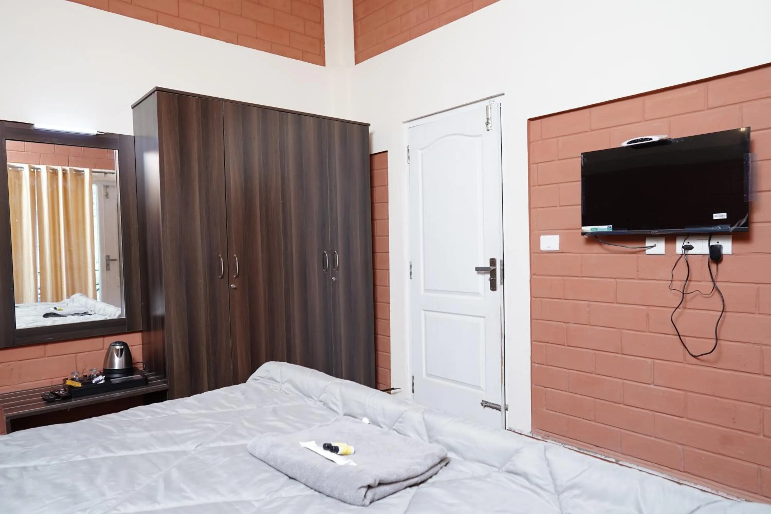 Bedroom in Tea Leaf Stays by Brown Tree Resorts