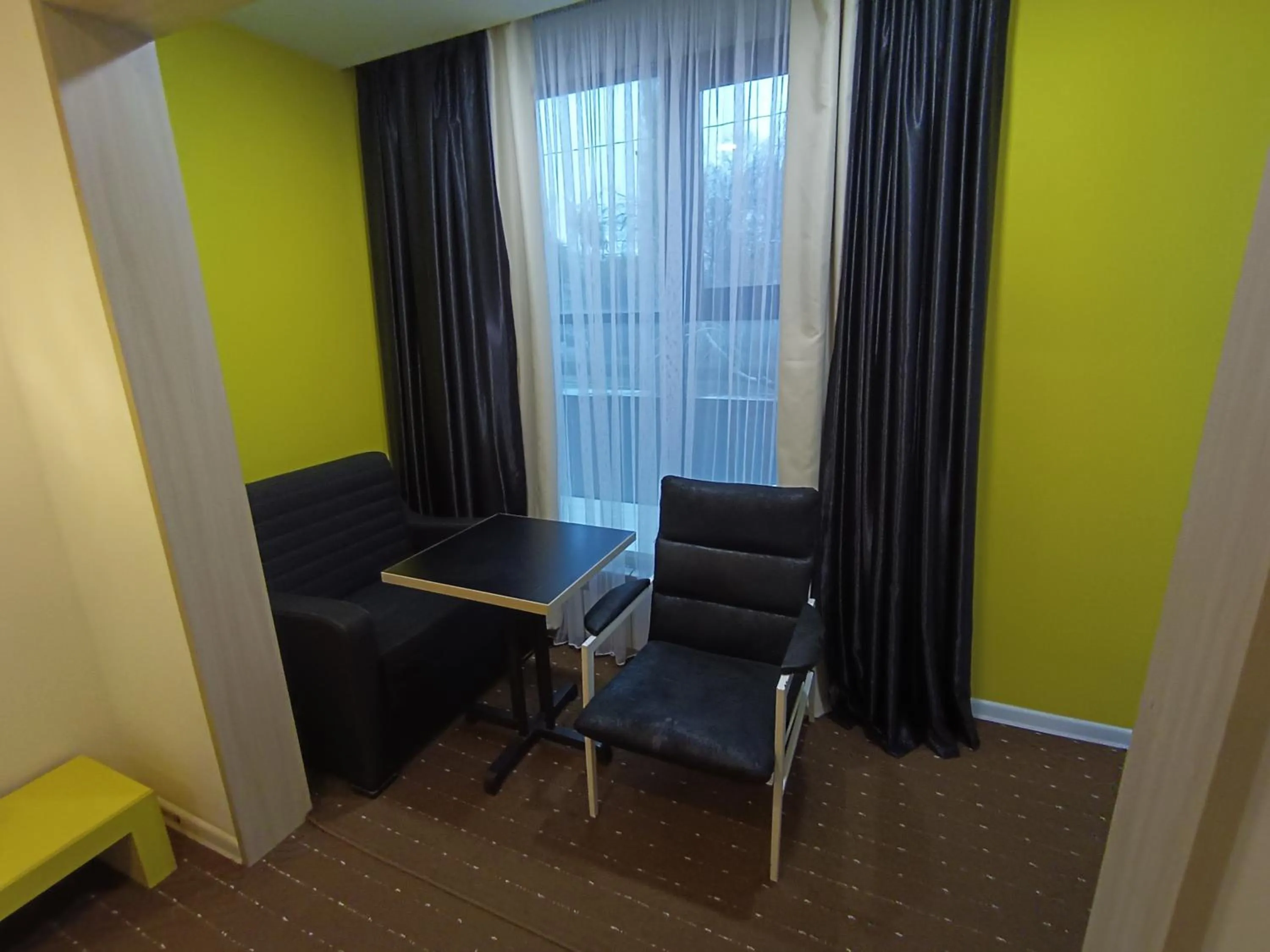 Seating area in iO Boutique Hotel Bishkek